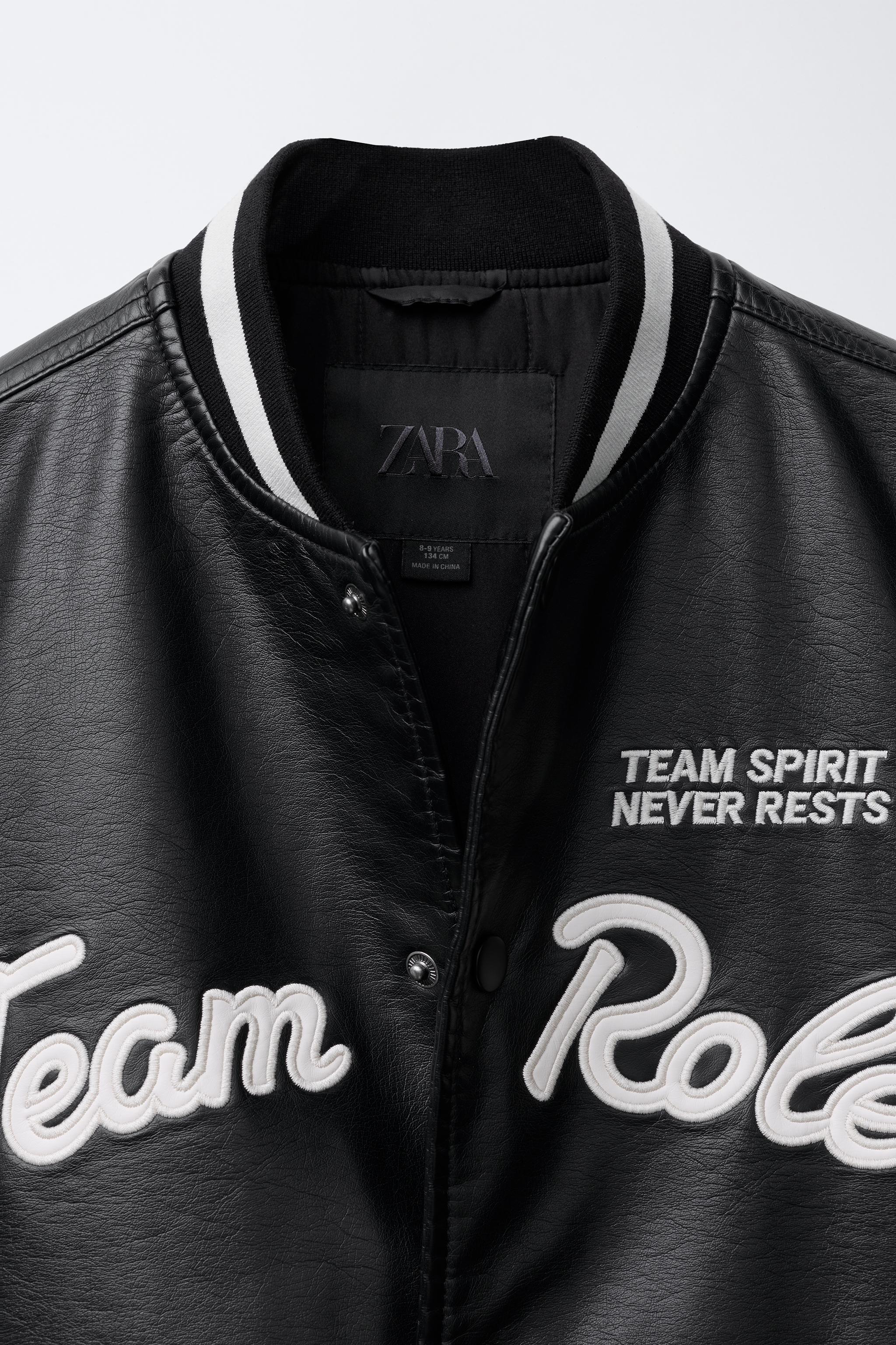 FAUX LEATHER BOMBER JACKET WITH EMBROIDERED TEXT