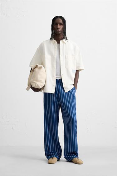 ÁO SƠ MI THÊU HỌA TIẾT KHÁC MÀU - Màu trắng từ Zara