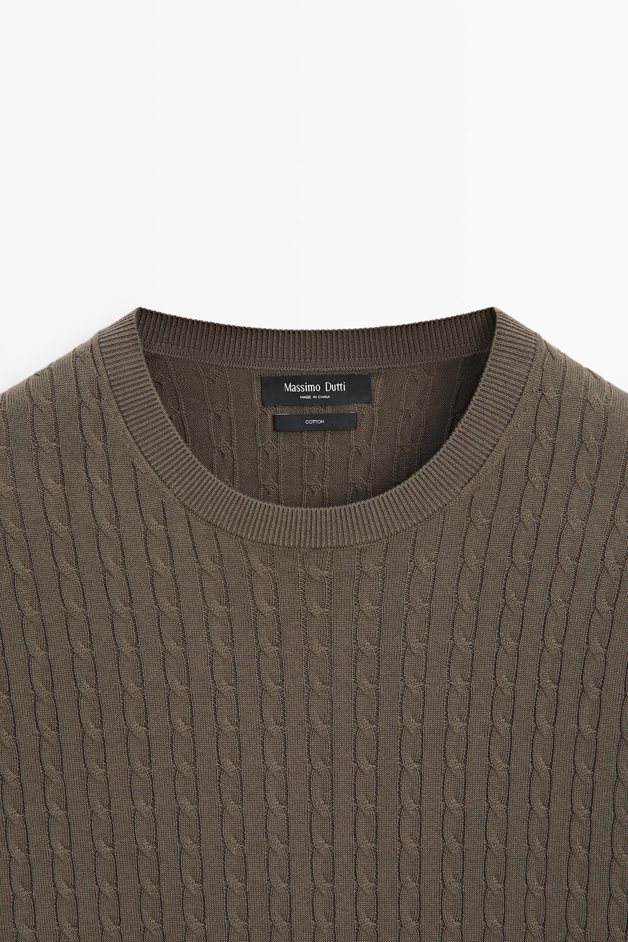 Cable-knit short sleeve sweater