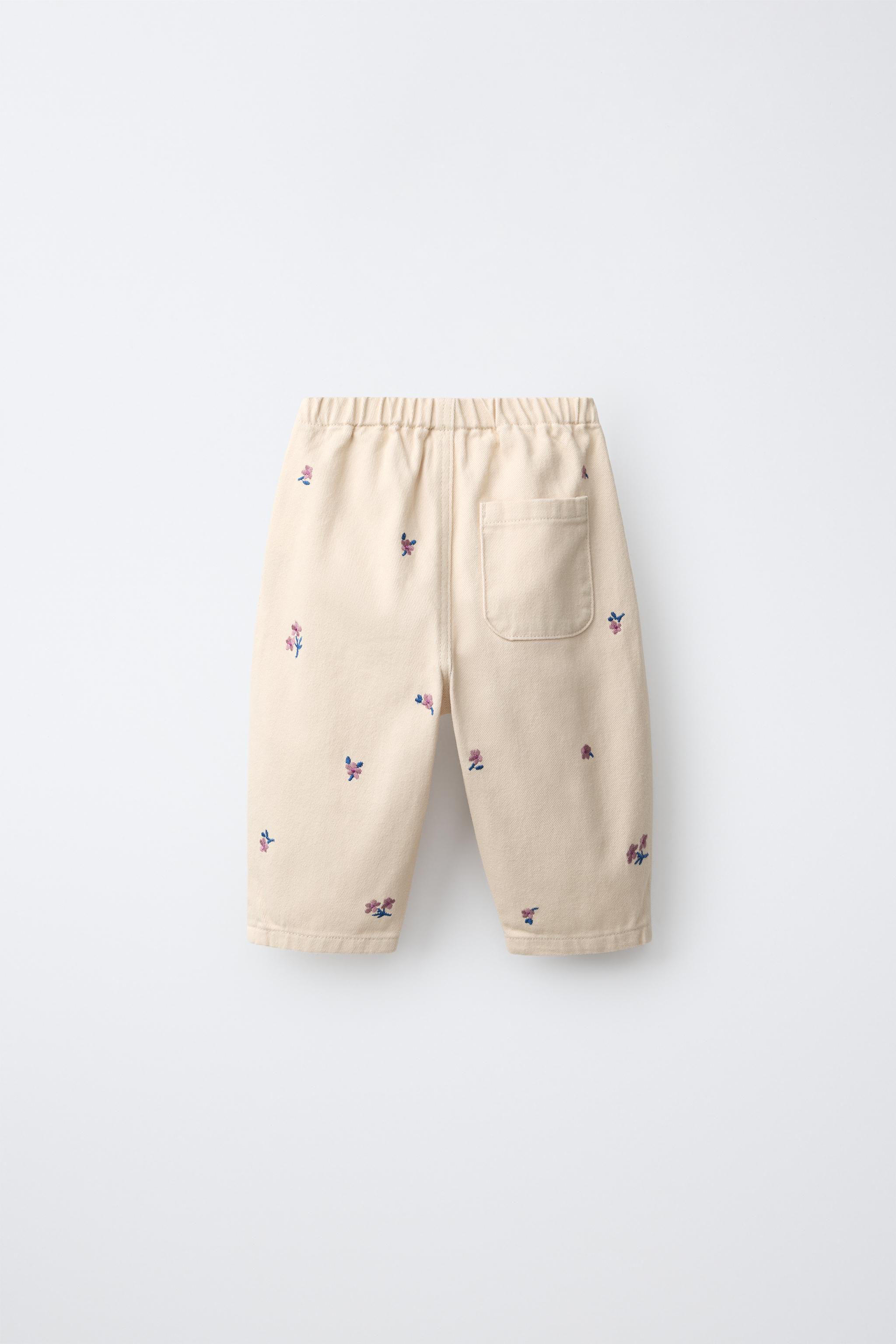 PANTALON BAGGY EN SERGÉ À FLEURS BRODÉES