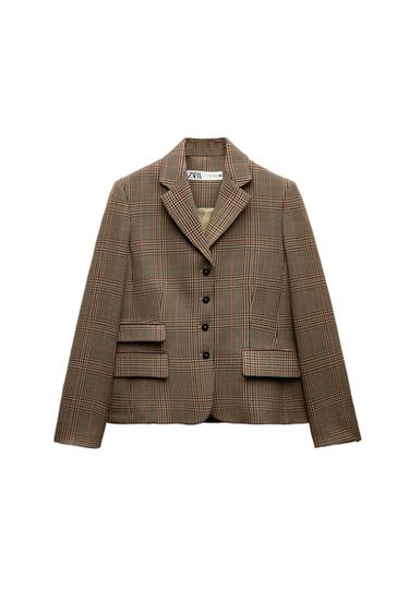 Front view of a checked jacket with lapels and front flap pockets.