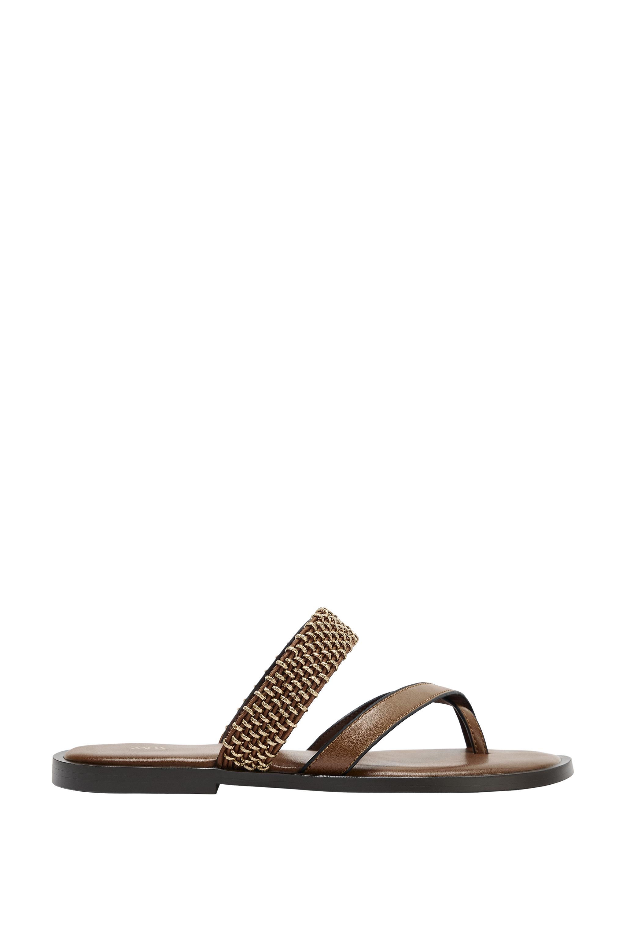 FLAT SANDALS WITH METAL DETAILS