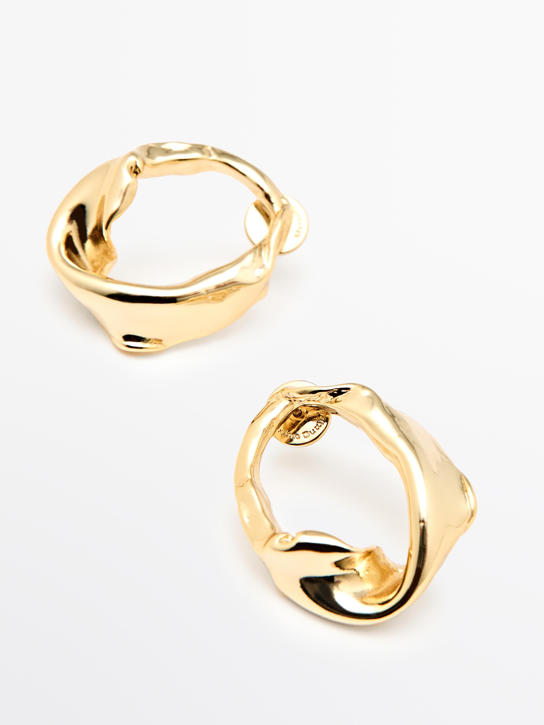 Boucles d'oreilles irrégulières