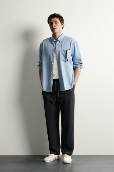 100% LYOCELL RELAXED FIT TROUSERS - Black by Zara