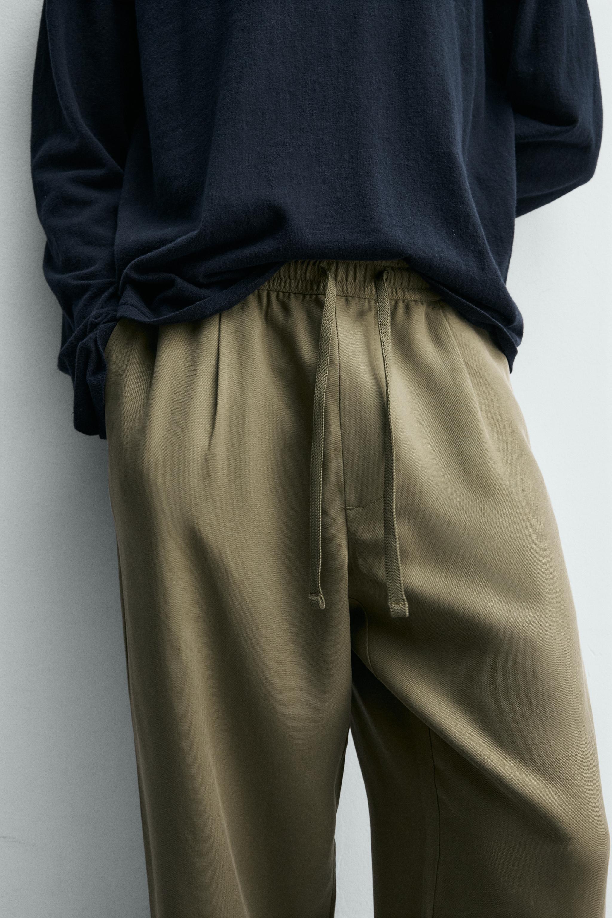 RELAXED FIT FLOWY PANTS