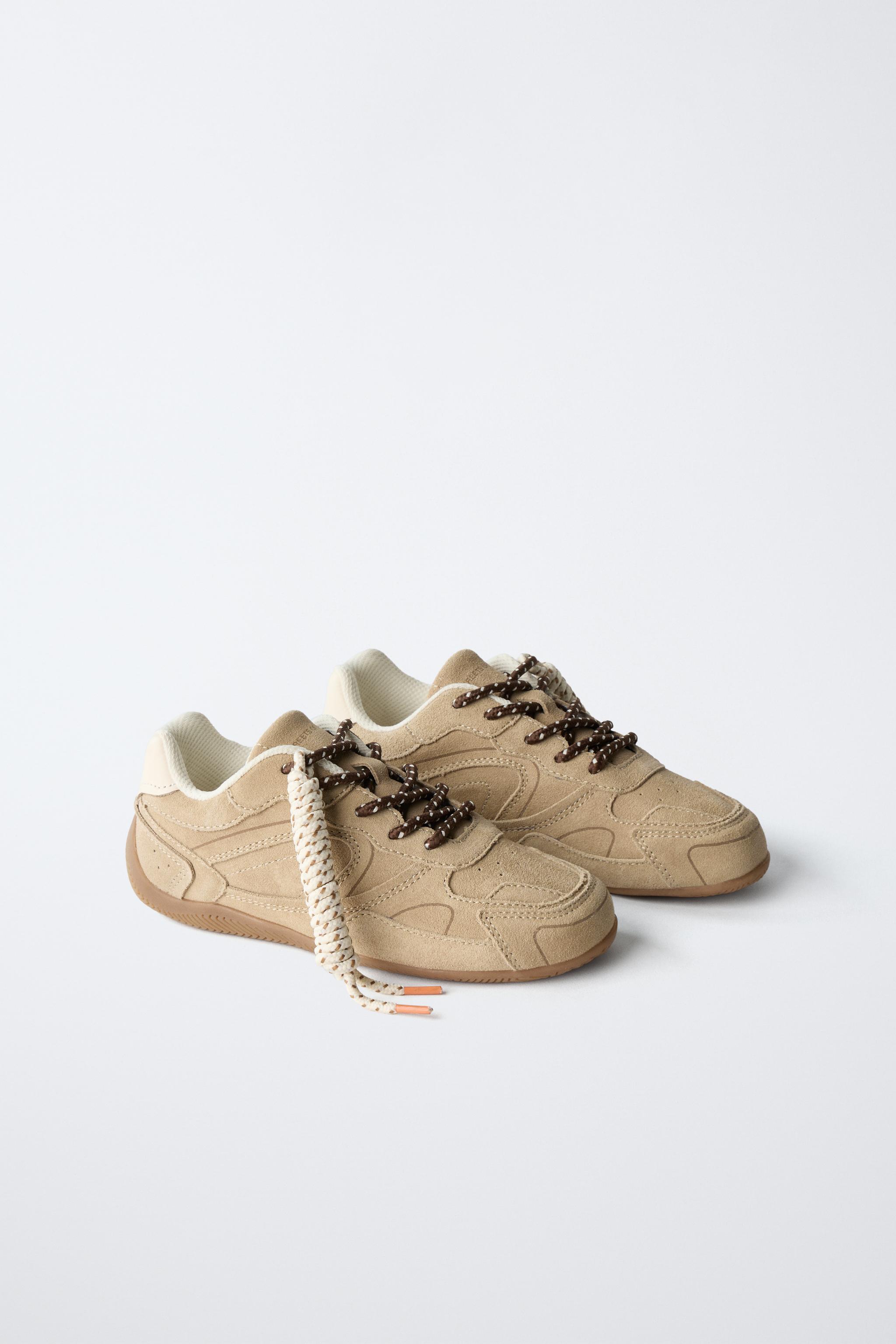 TENNIS EN CUIR À LACETS