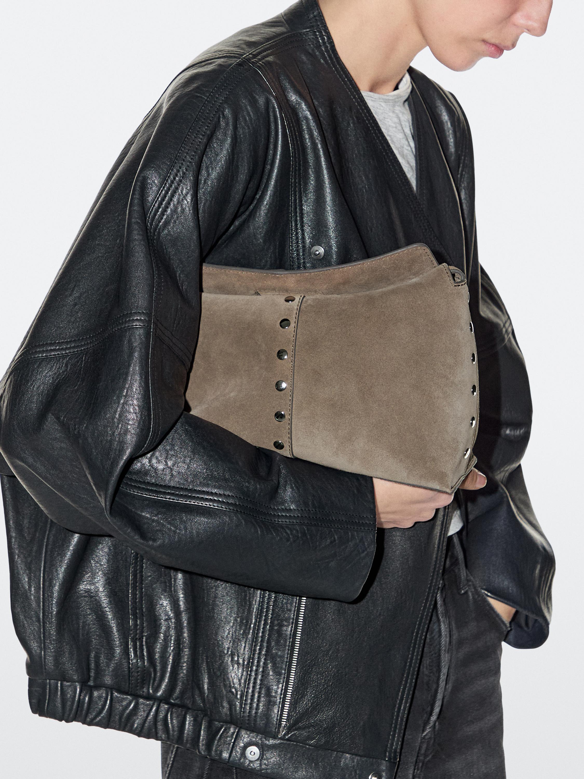 Split leather bag with stud details