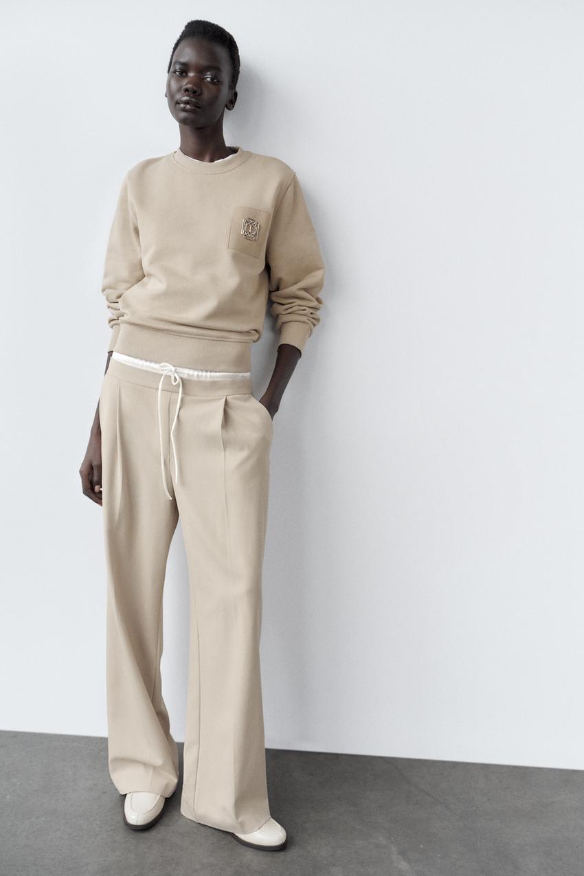 BROOCH SWEATSHIRT