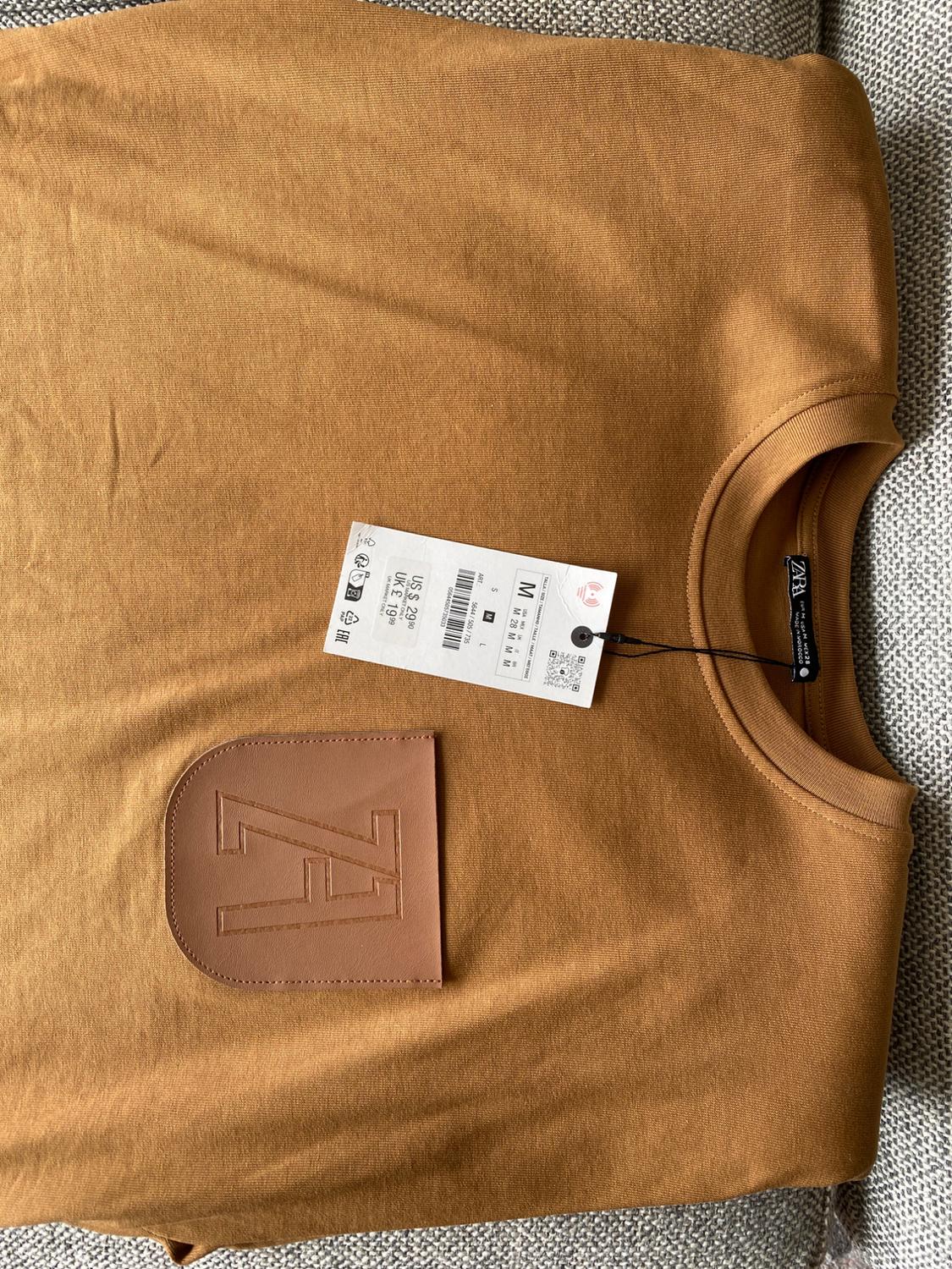 TOP WITH PADDED SHOULDERS AND LABEL - Image 6