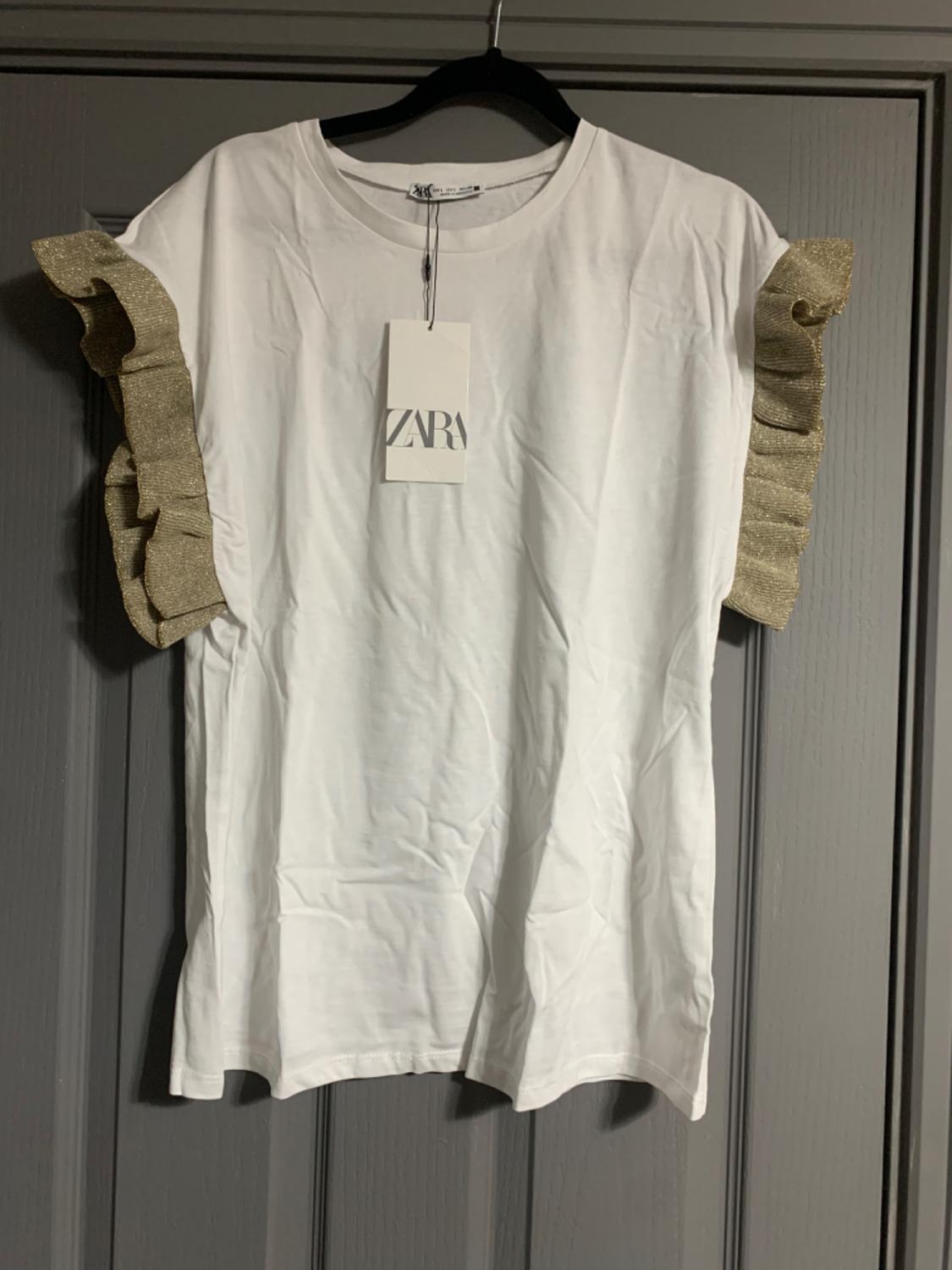 T-SHIRT EMBELLISHED WITH RHINESTONES