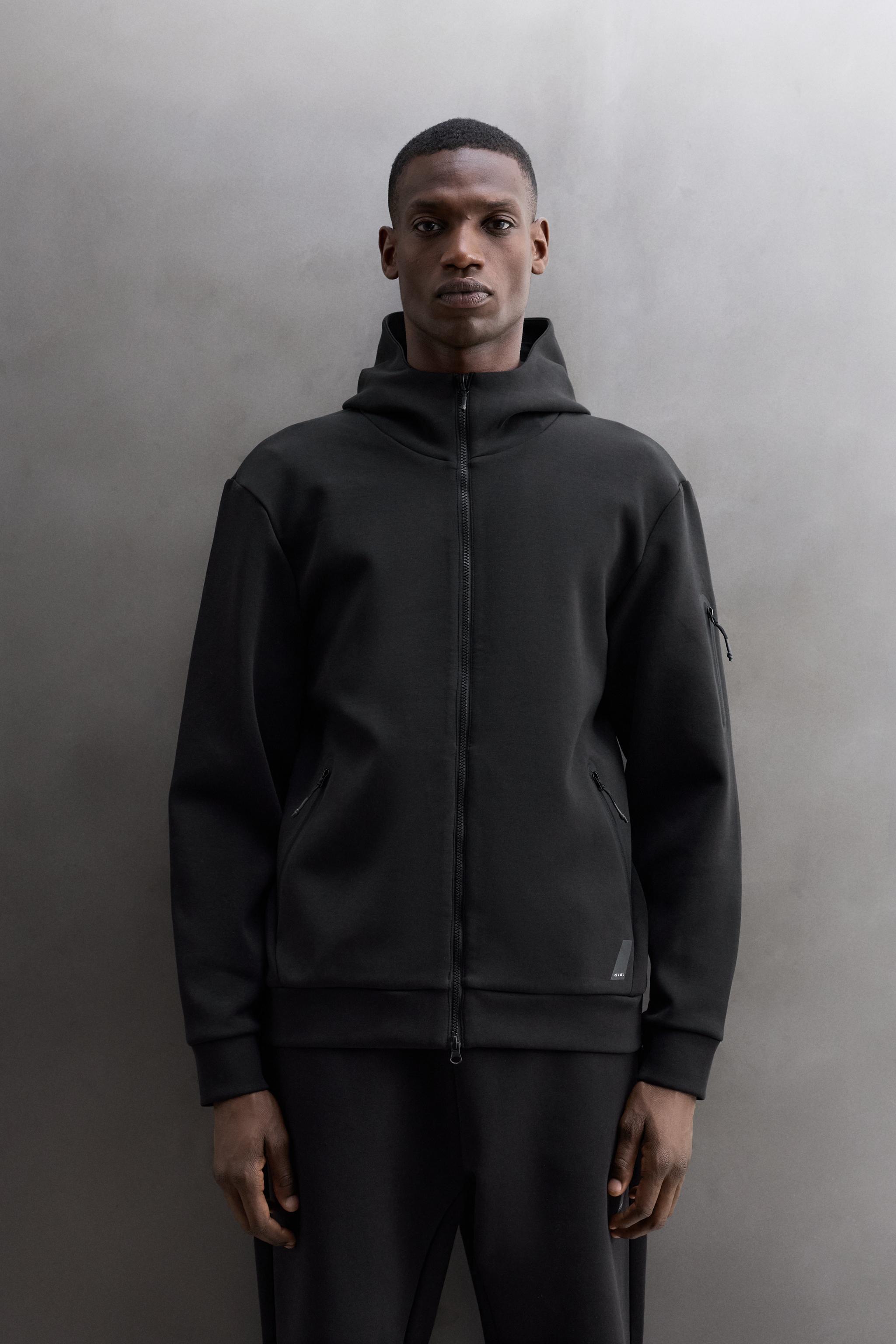 TECHNICAL ZIP-UP HOODIE