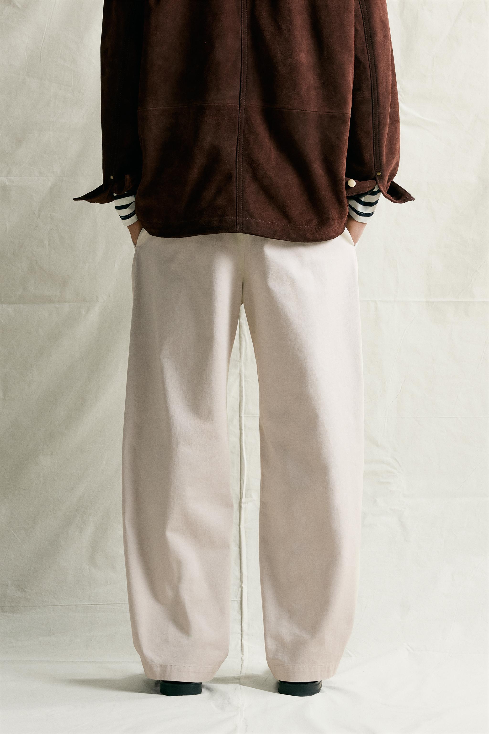 RELAXED FIT PLEATED CHINO PANTS