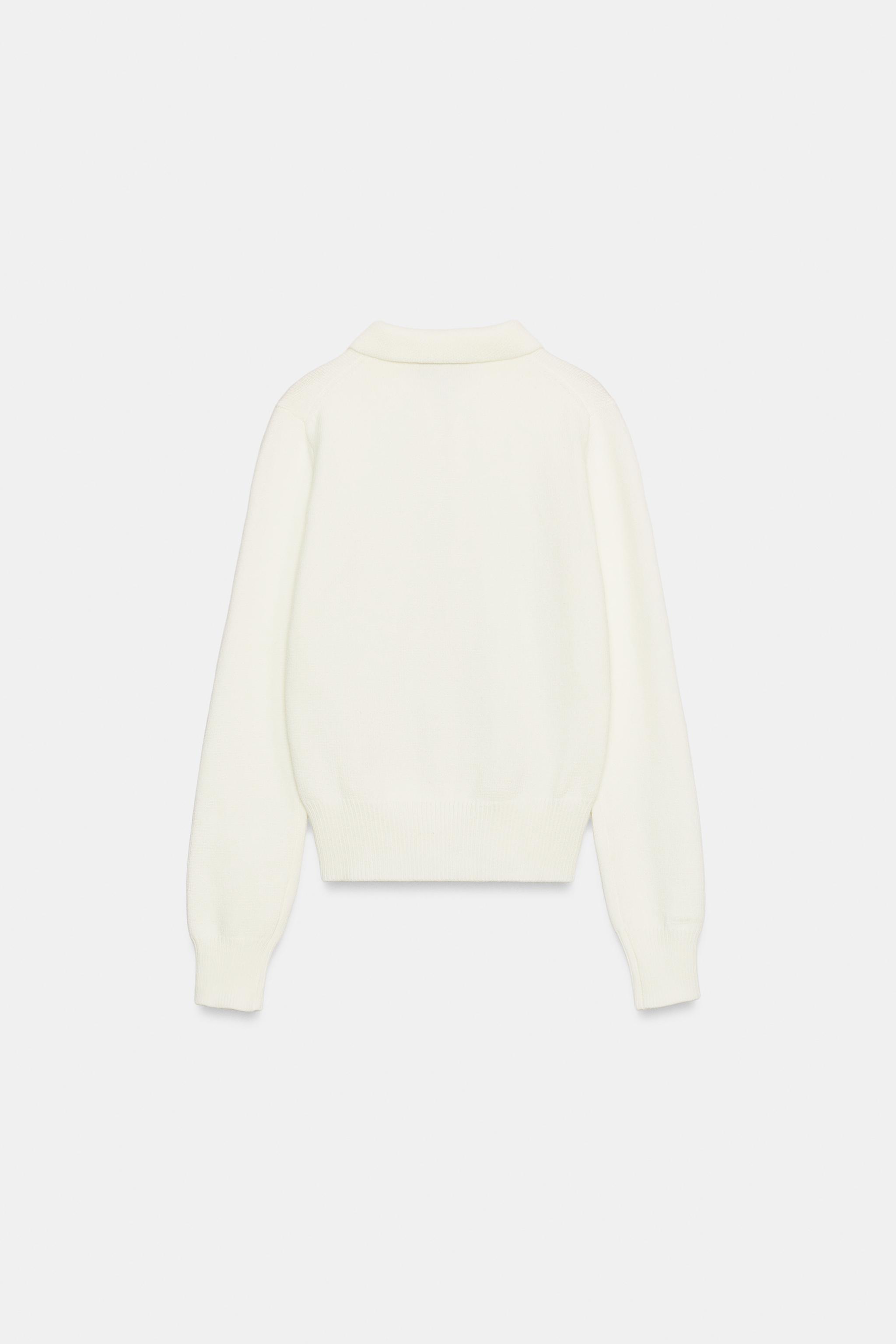 POLO EN MAILLE À ZIP