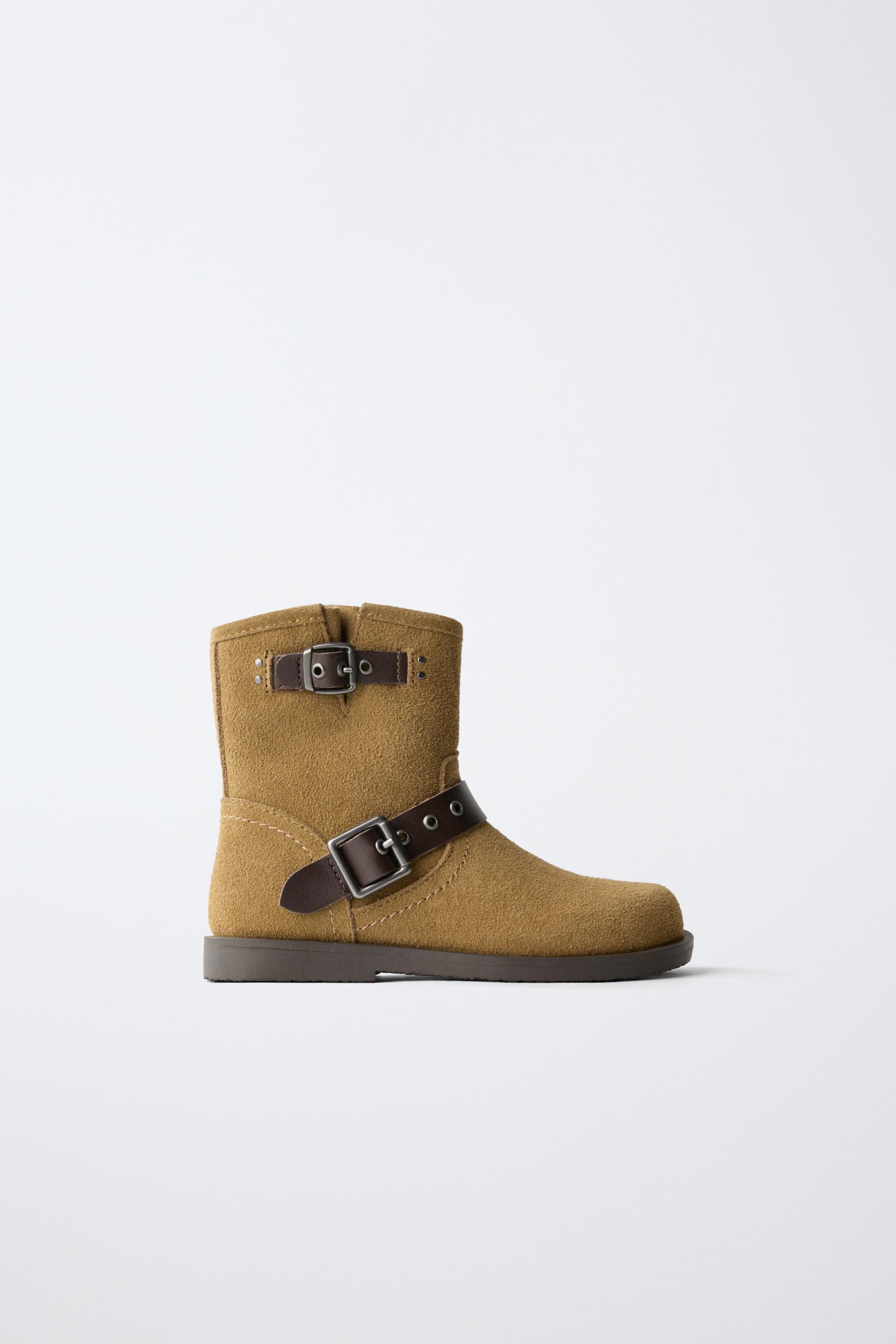 BOTTINES EN CUIR À DOUBLE BOUCLE