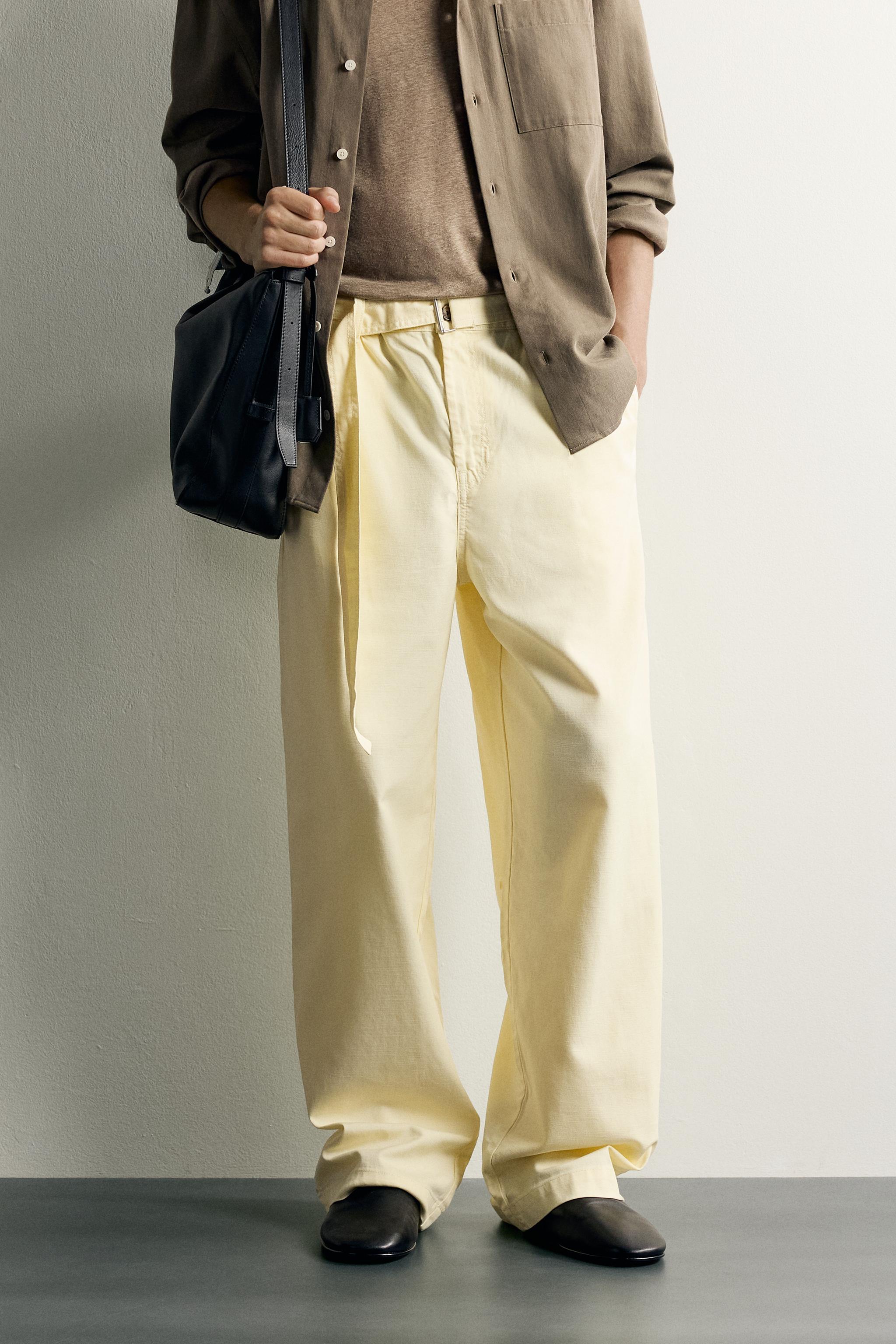 RELAXED FIT PLEATED BELTED PANTS — Light yellow