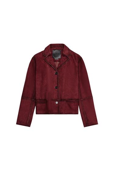 Front view of a burgundy jacket with lapels and front button fastening.