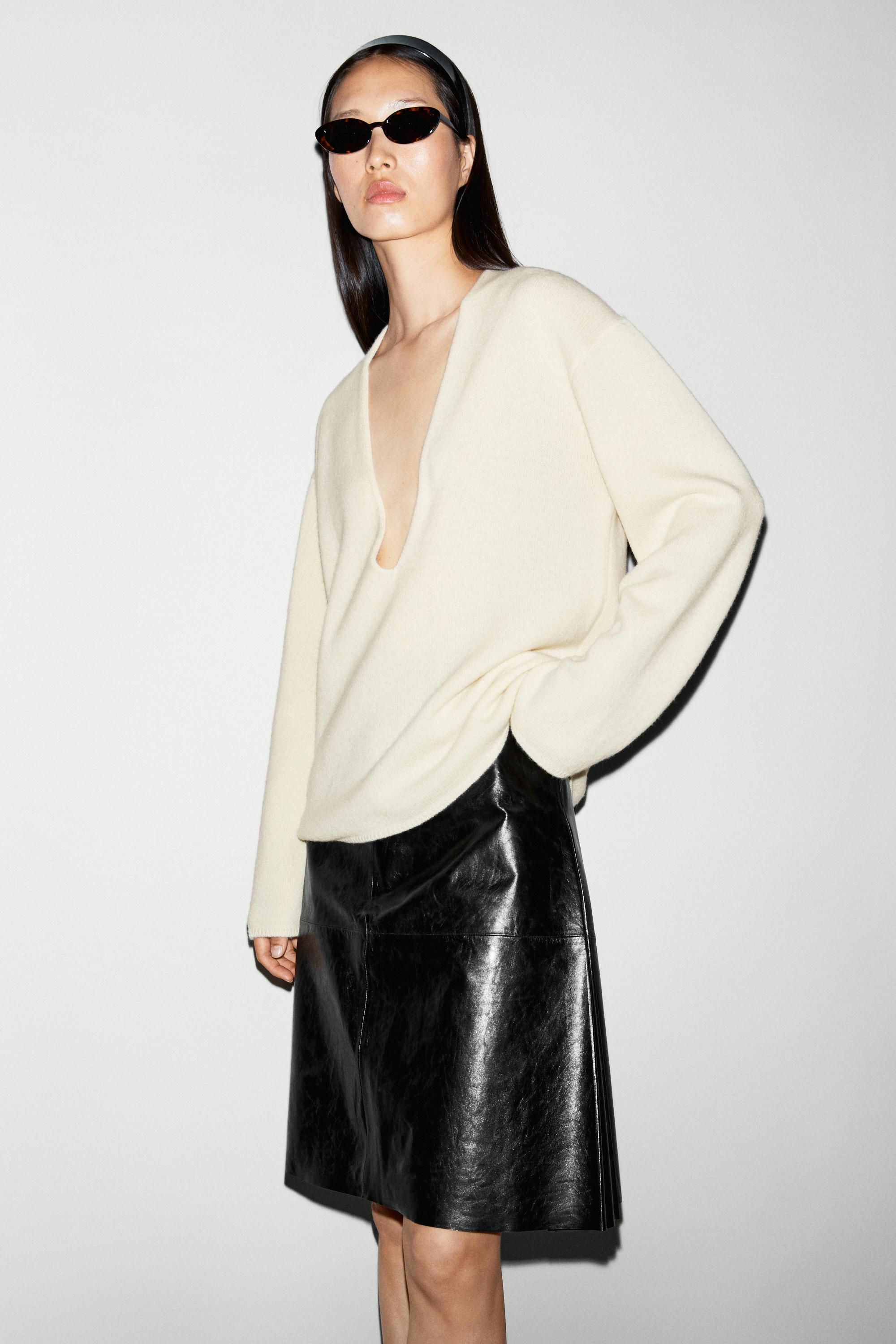 Long-line knit sweater with neckline detail — Tan marl