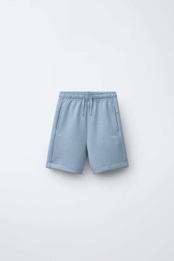 BERMUDA SPORTY COM MENSAGEM - Verde / Azul da Zara - Imagem 0