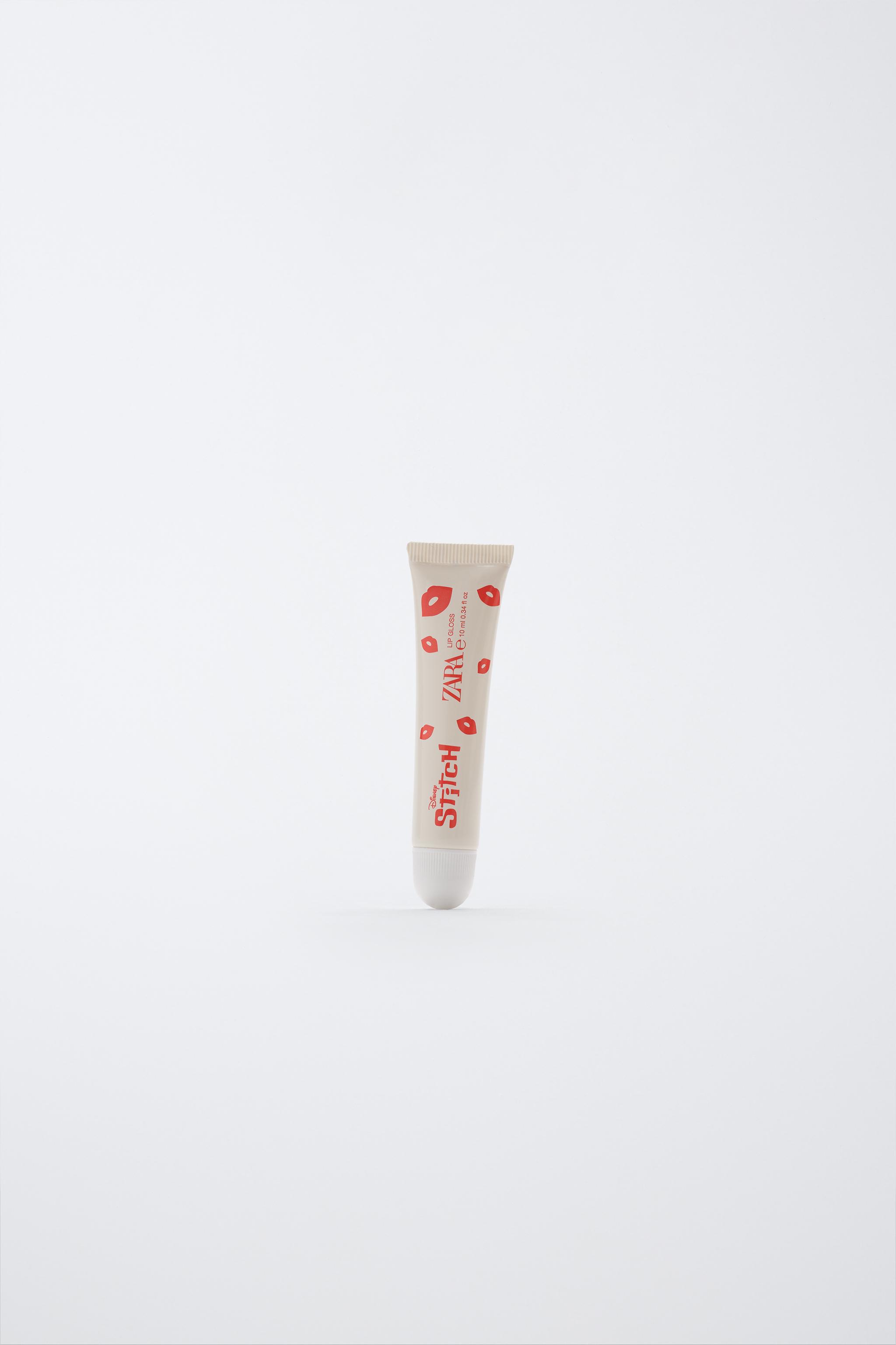STITCH © DISNEY LIP GLOSS 0.34 FL. OZ. — TINTED LEATHER