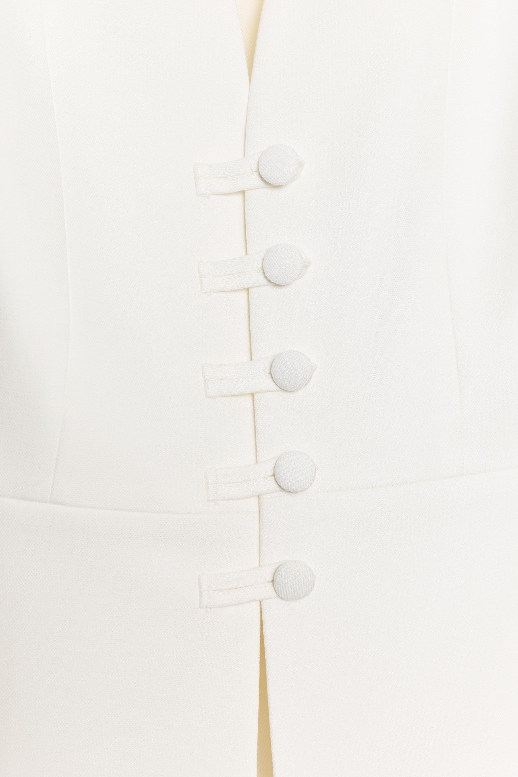 GILET PEPLUM