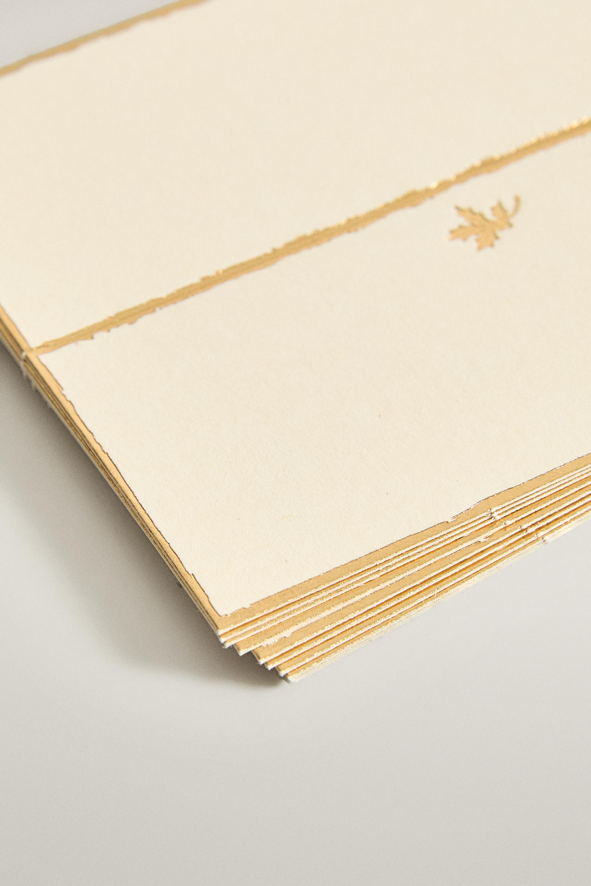 MARQUE-PLACE RECTANGULAIRE PAPIER FILET DORÉ NOËL (LOT DE 12)