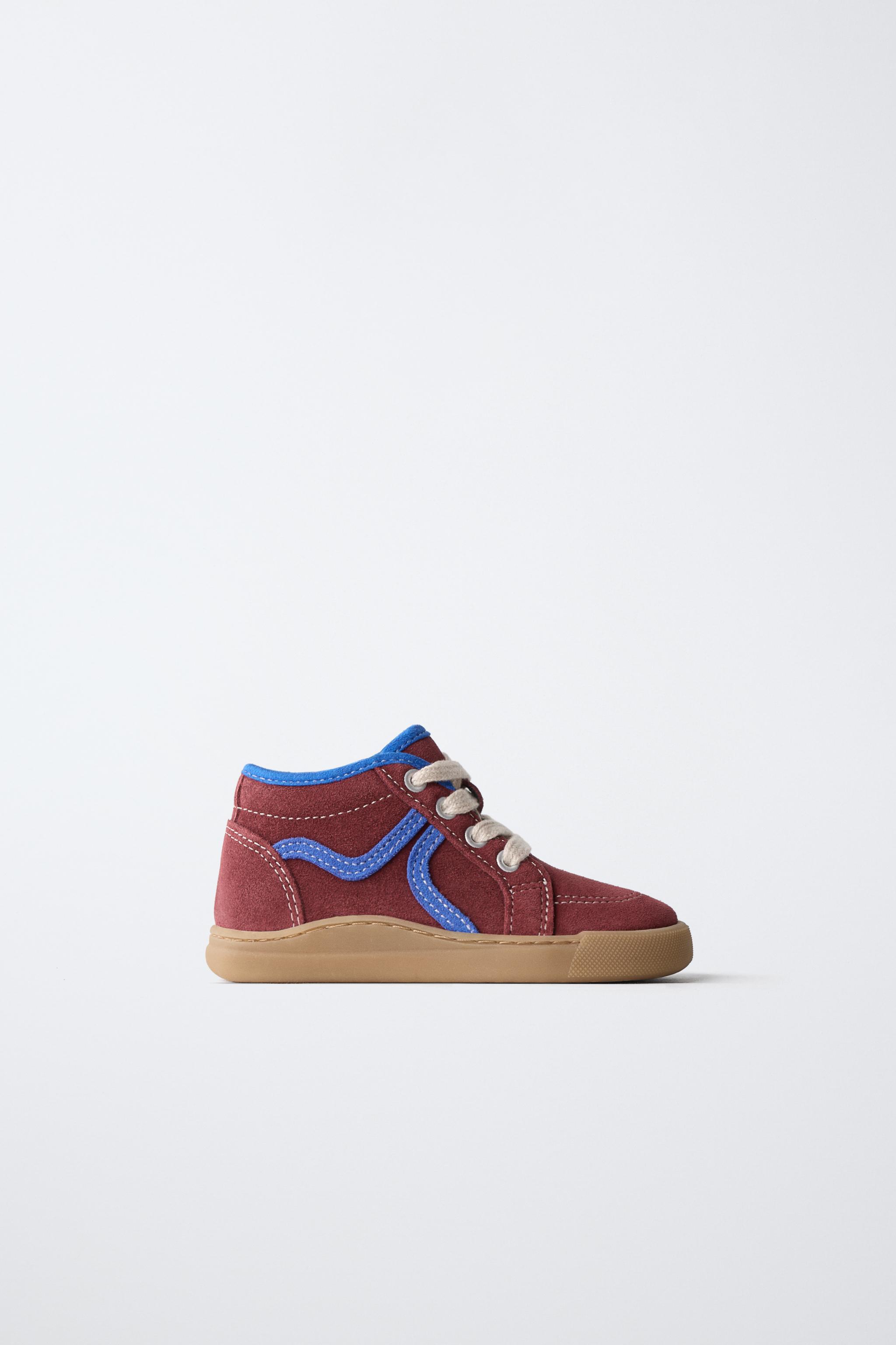 BASKETS MONTANTES EN CUIR
