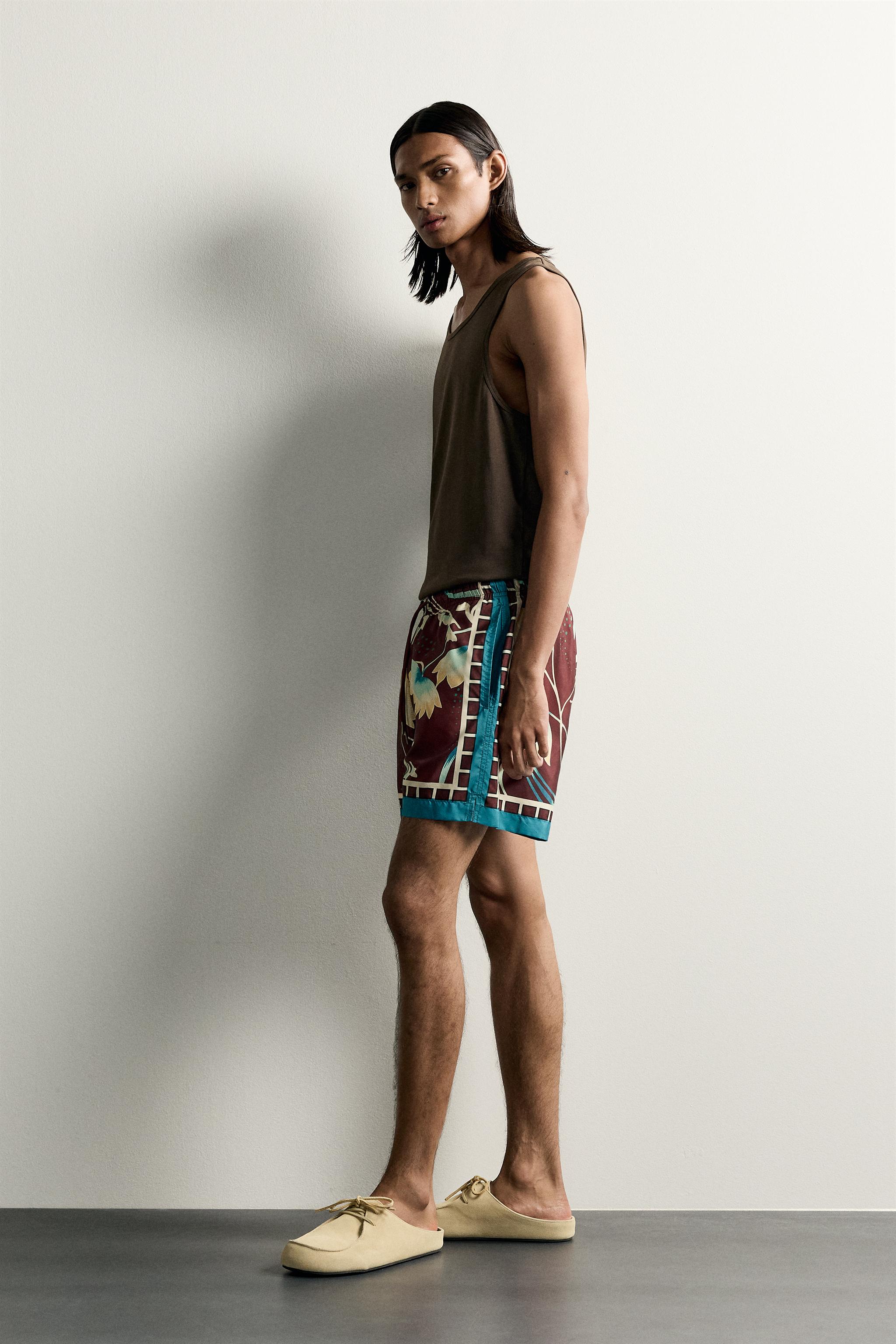 LIMITED EDITION MIXED PRINT SWIM SHORTS