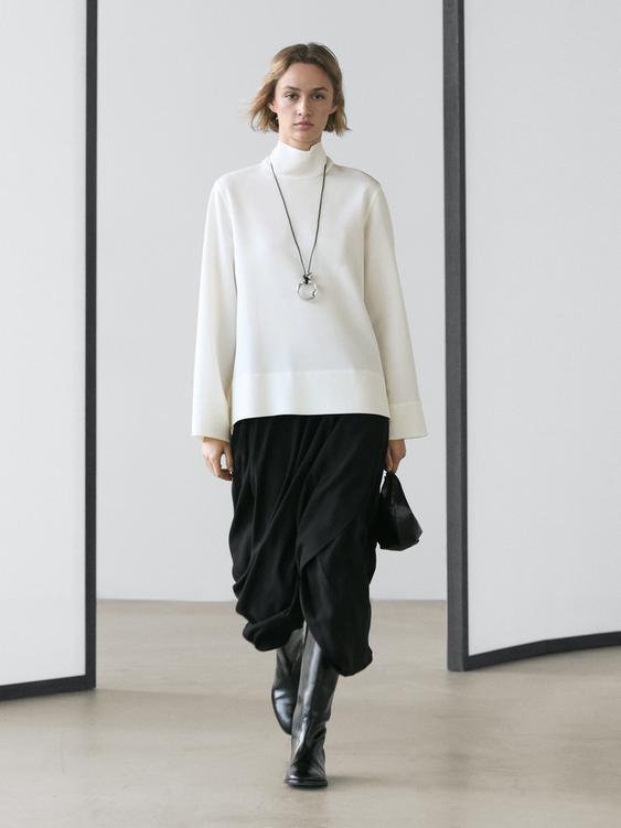 High neck blouse with hem detail