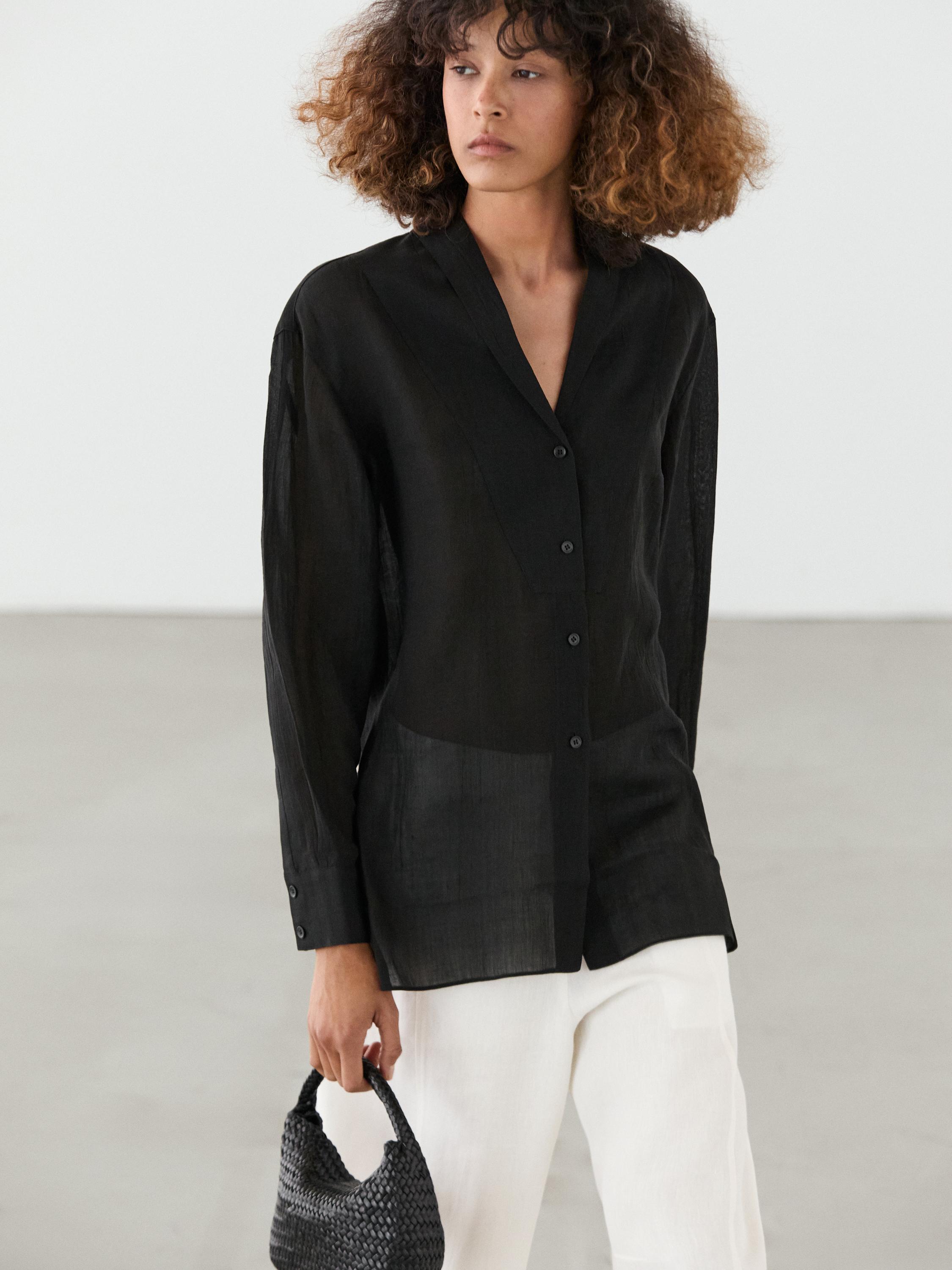 Flowing semi-sheer shirt with chest detail