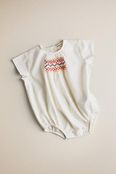 KIDS' SMOCKED BODYSUIT — Cream 1