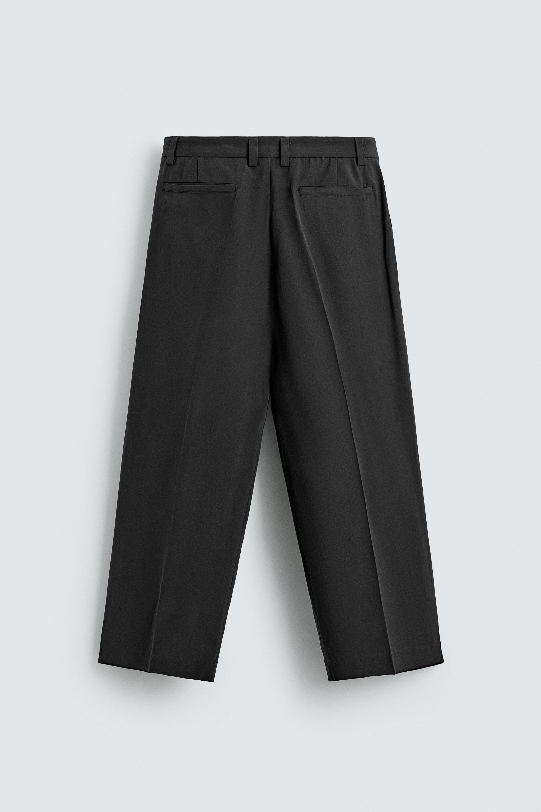 RELAXED FIT FLOWY PANTS