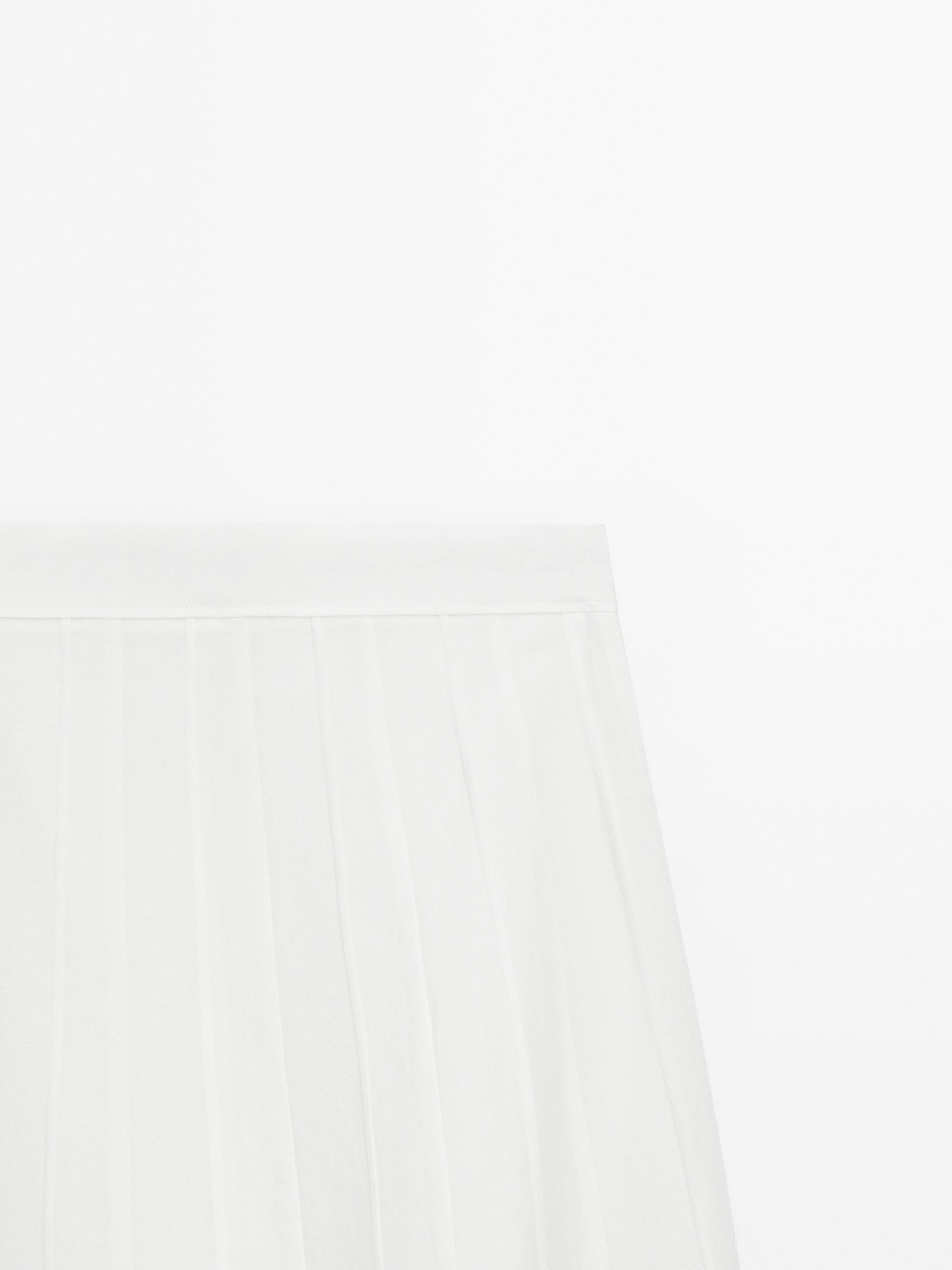 Jupe midi godets coutures apparentes