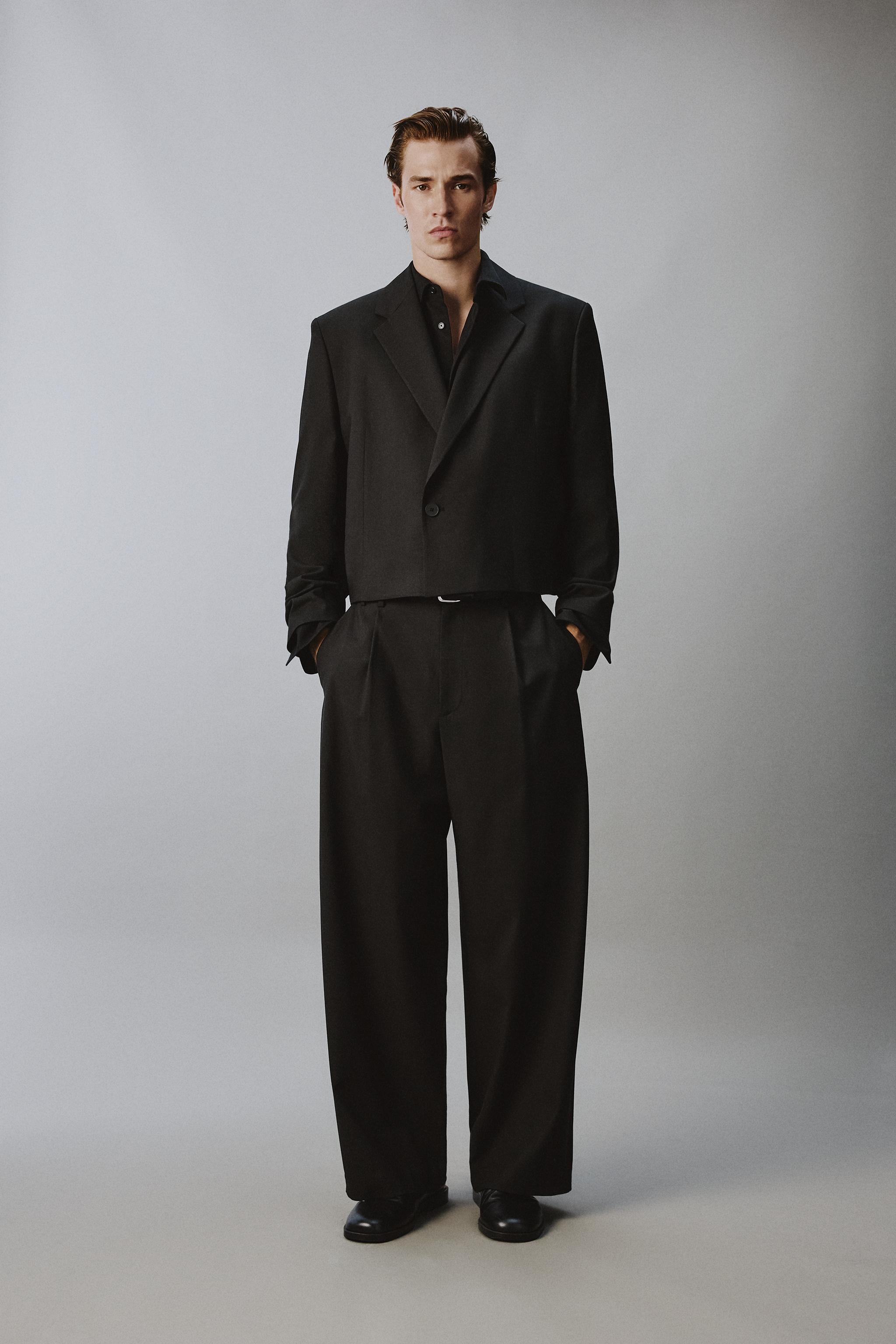 RELAXED FIT PLEATED SUIT PANTS