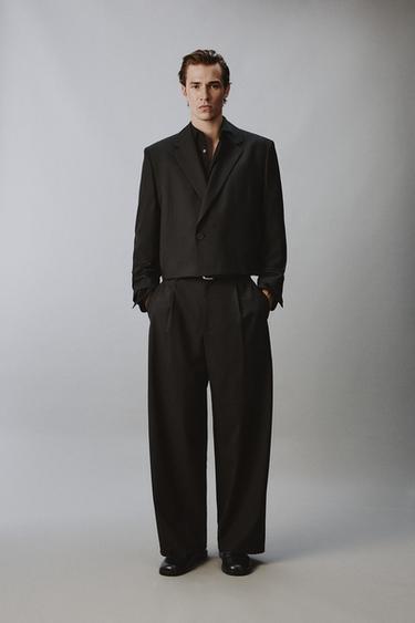 PANTALÓN RELAXED FIT PLIEGUES TRAJE - Negro de Zara - Imagen 0