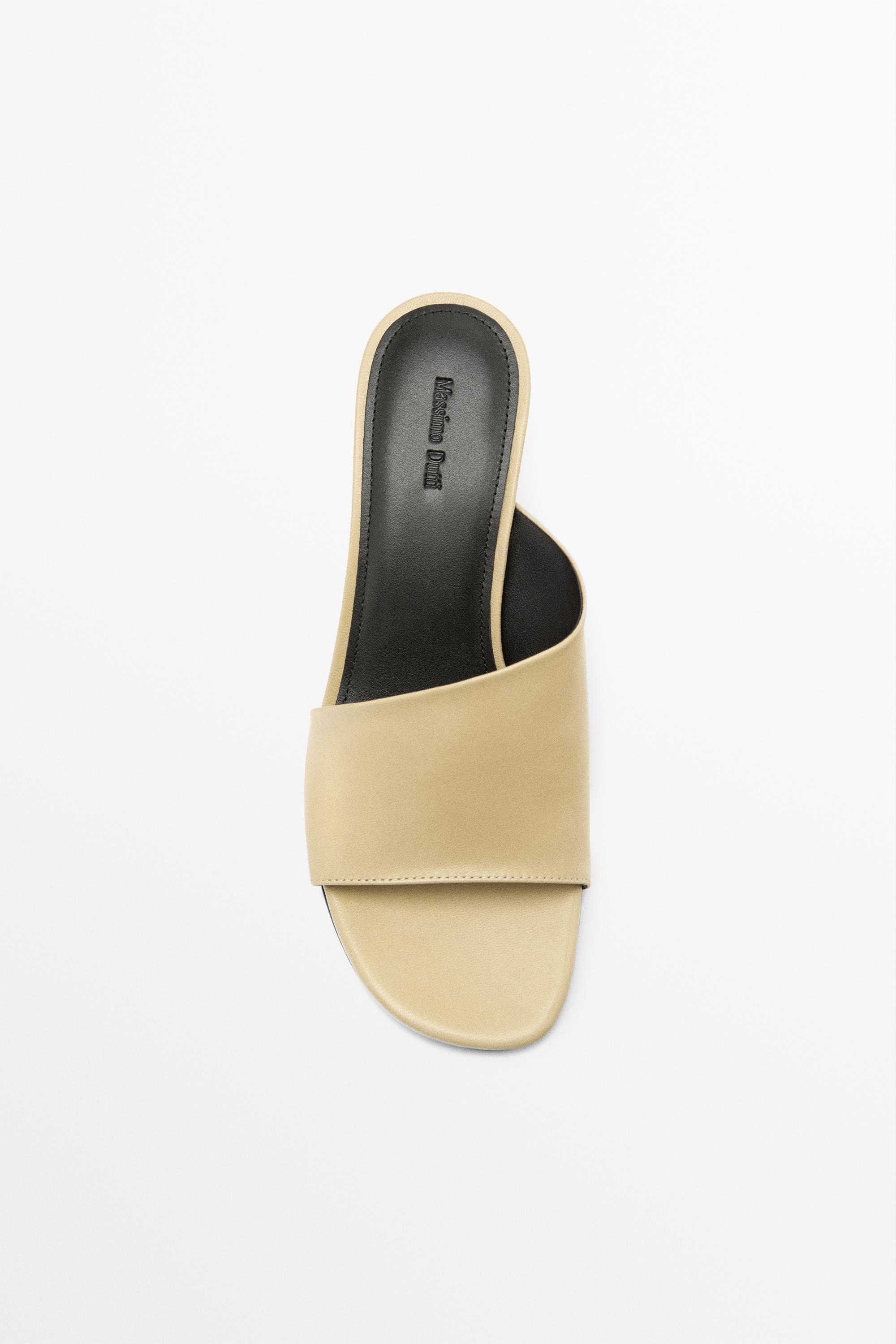 Sandale compensée en cuir souple