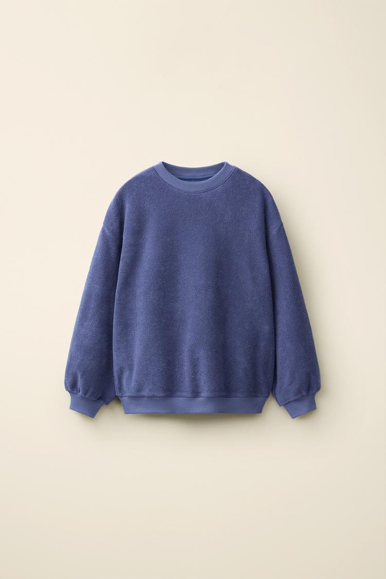 Sudadera toalla created by caramel london x zara