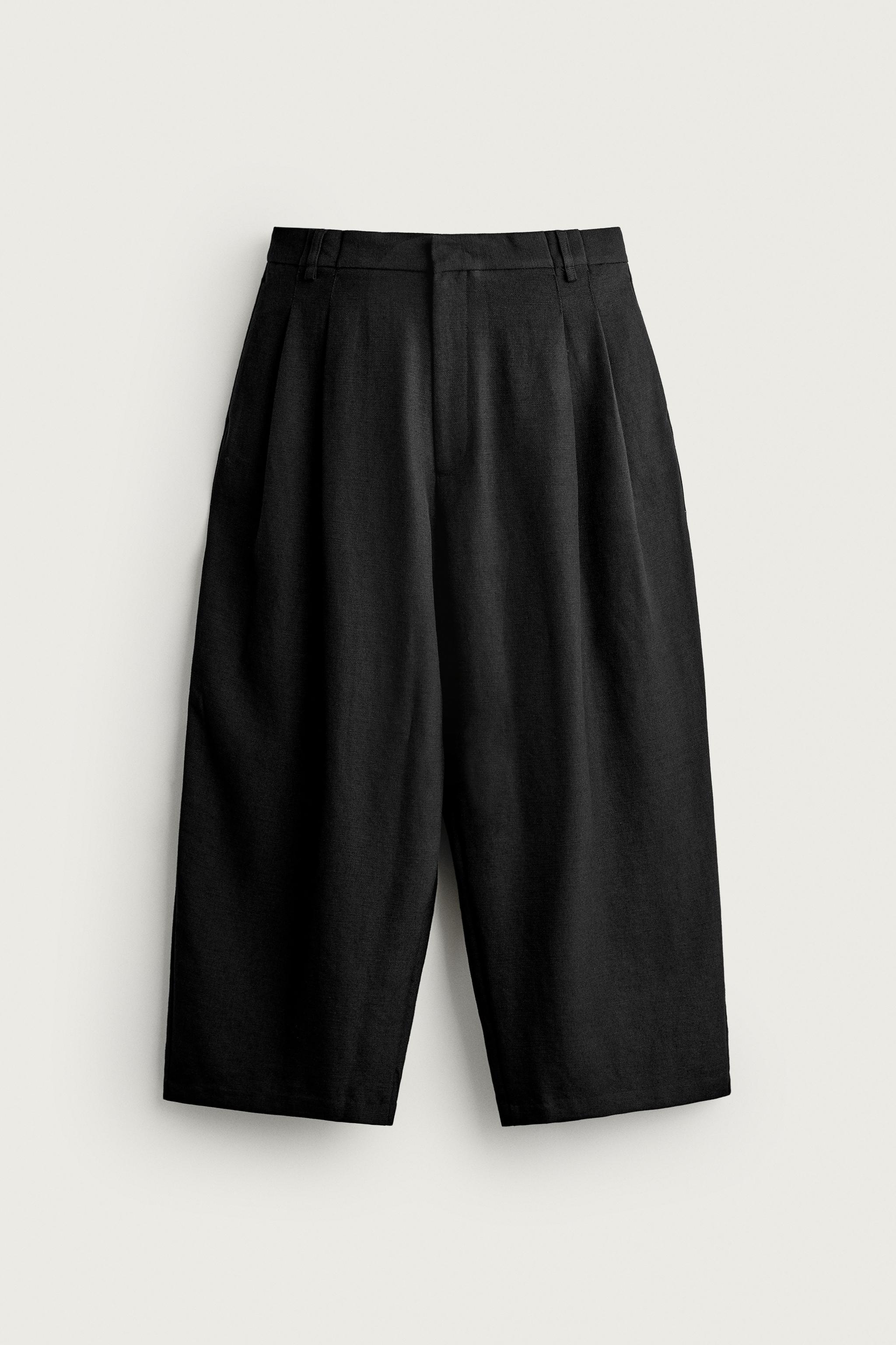 RELAXED WIDE-FIT PLEATED PANTS — Black
