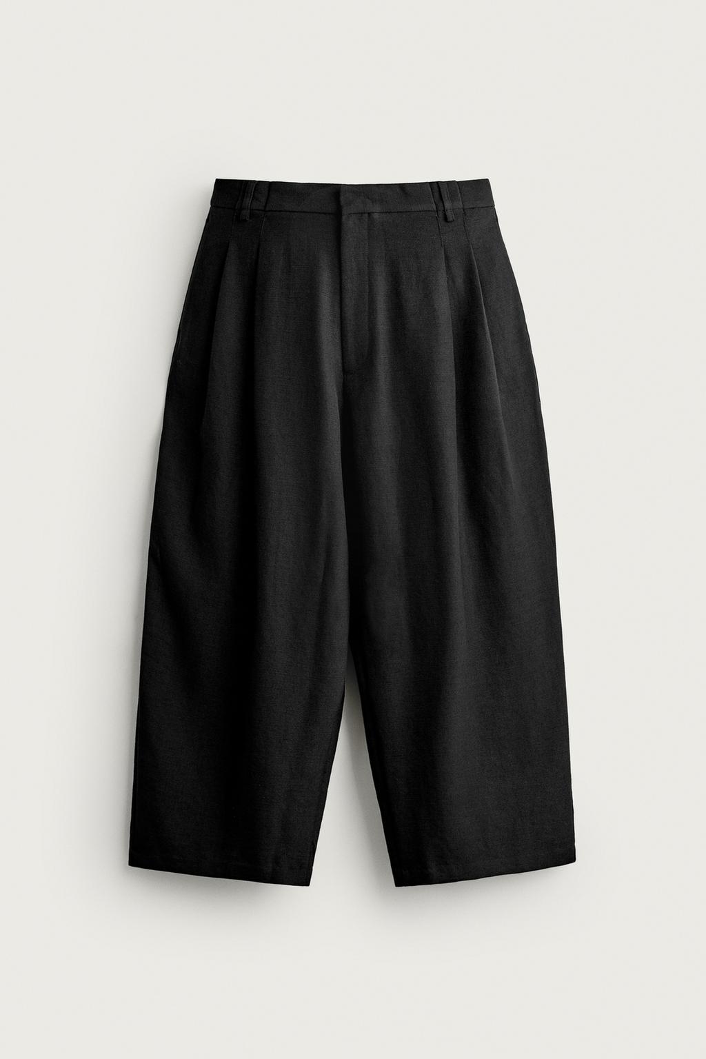 RELAXED WIDE-LEG PLEATED TROUSERS