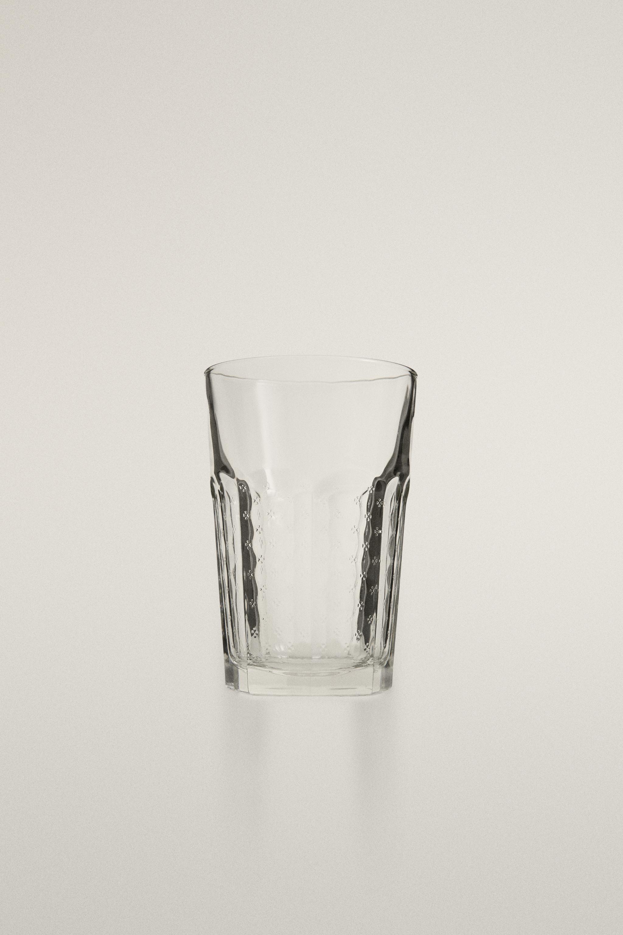 RAISED FLORAL DESIGN GLASS TUMBLER — Transparent