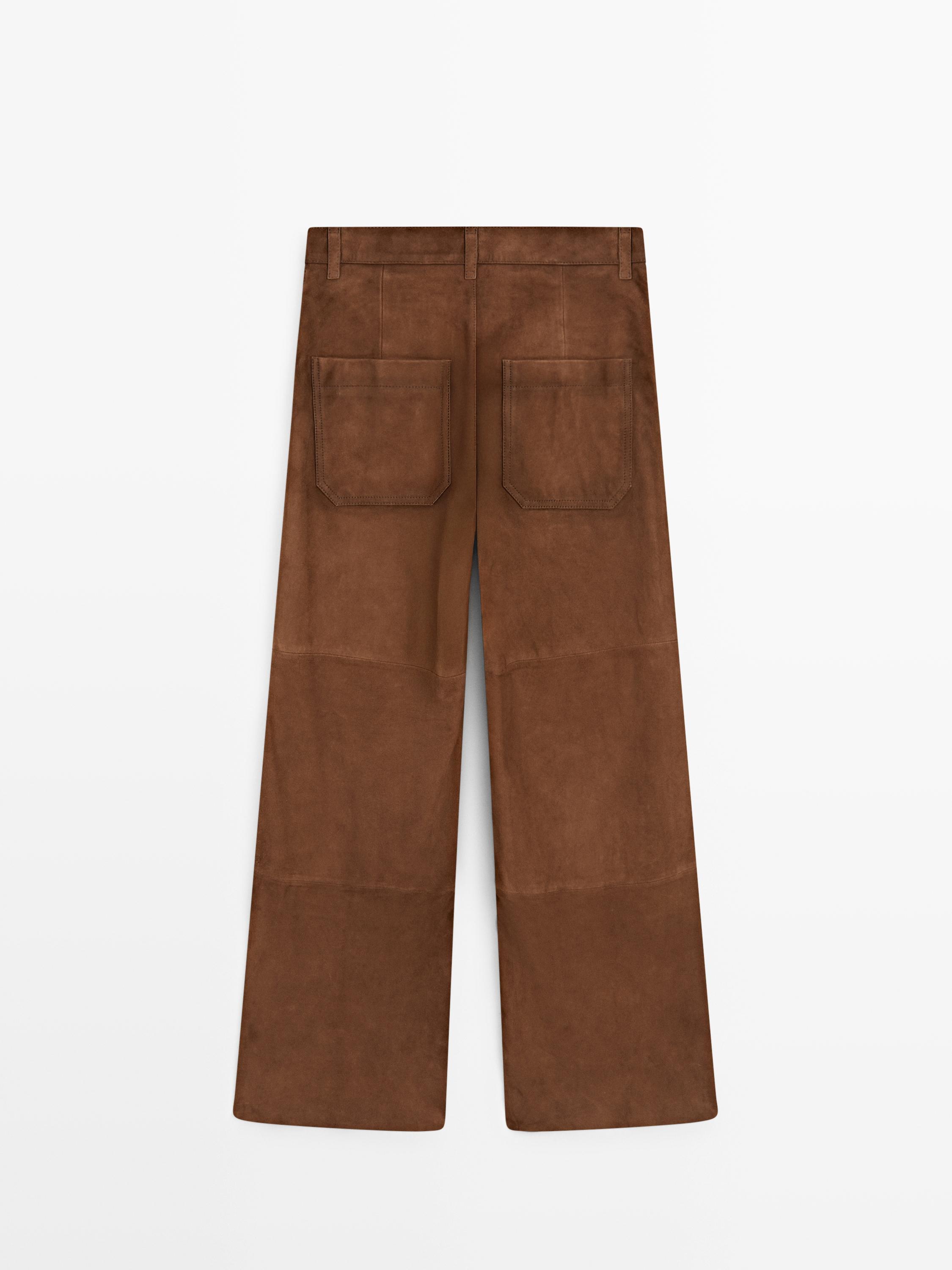 Pantalon large poches en cuir et daim