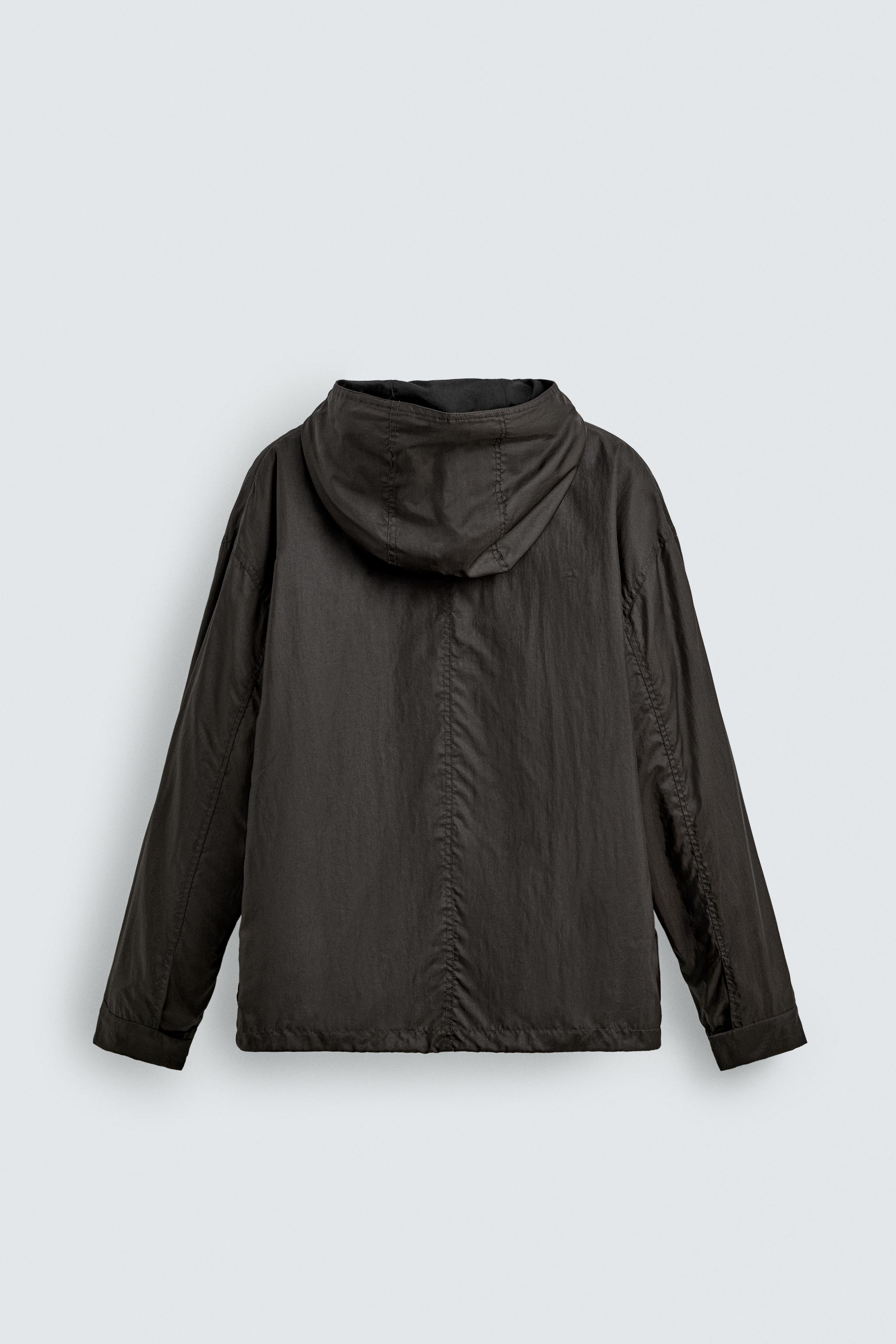 BLOUSON TECHNIQUE À CAPUCHE