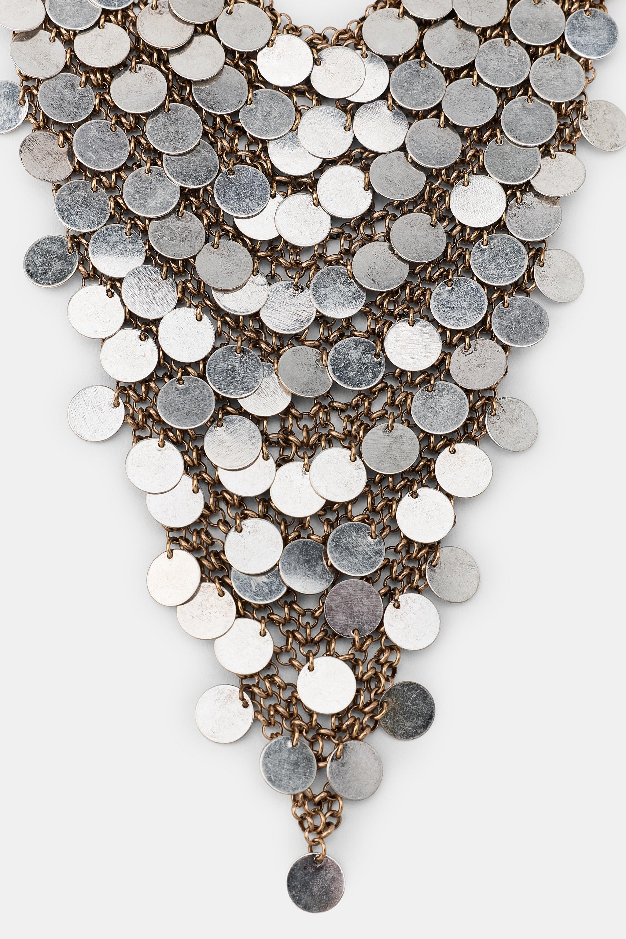 COLLIER BAVOIR PLAQUES MÉTALLIQUES