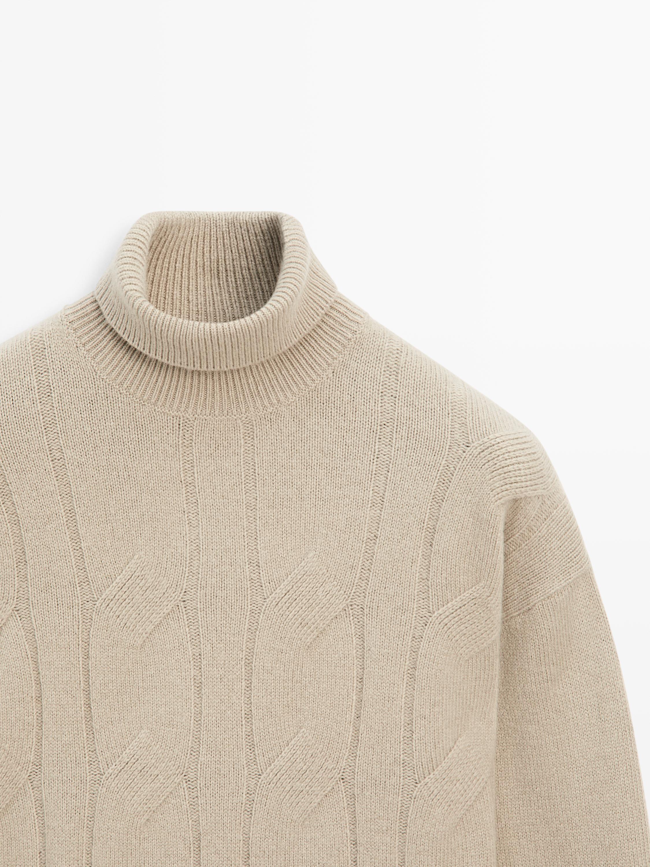 Wool blend knit sweater with high neck