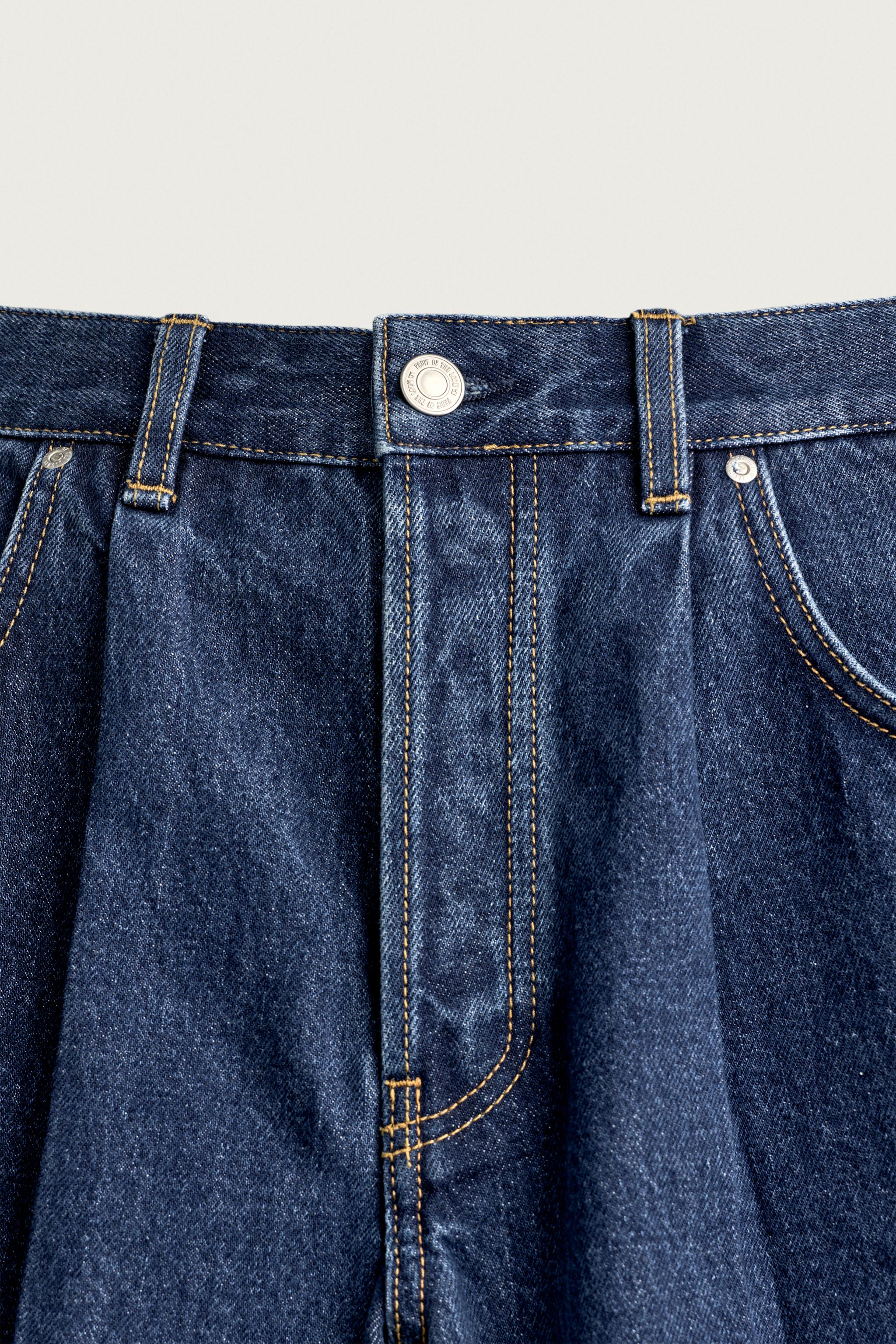 BERMUDA EN JEAN À PLIS ET PIÈCE FRUIT OF THE LOOM™