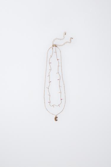 LOT DE DEUX COLLIERS AVEC PENDENTIF CROISSANT - Doré de Zara