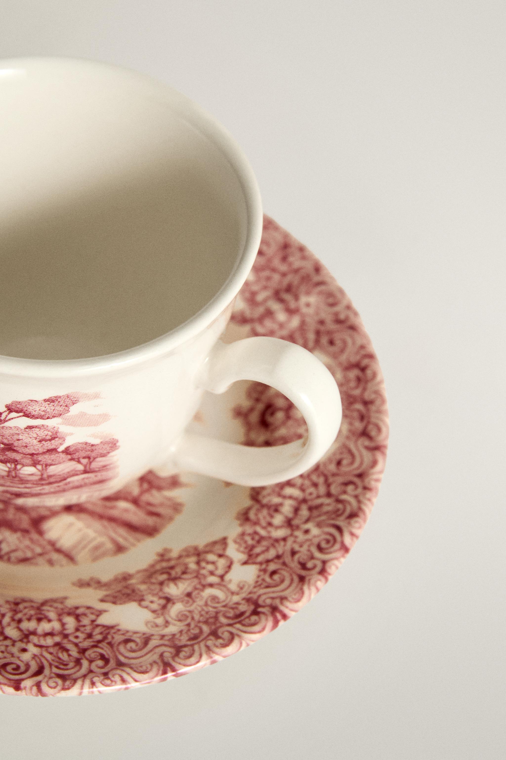 FLORAL AND LANDSCAPE EARTHENWARE COFFEE CUP AND SAUCER