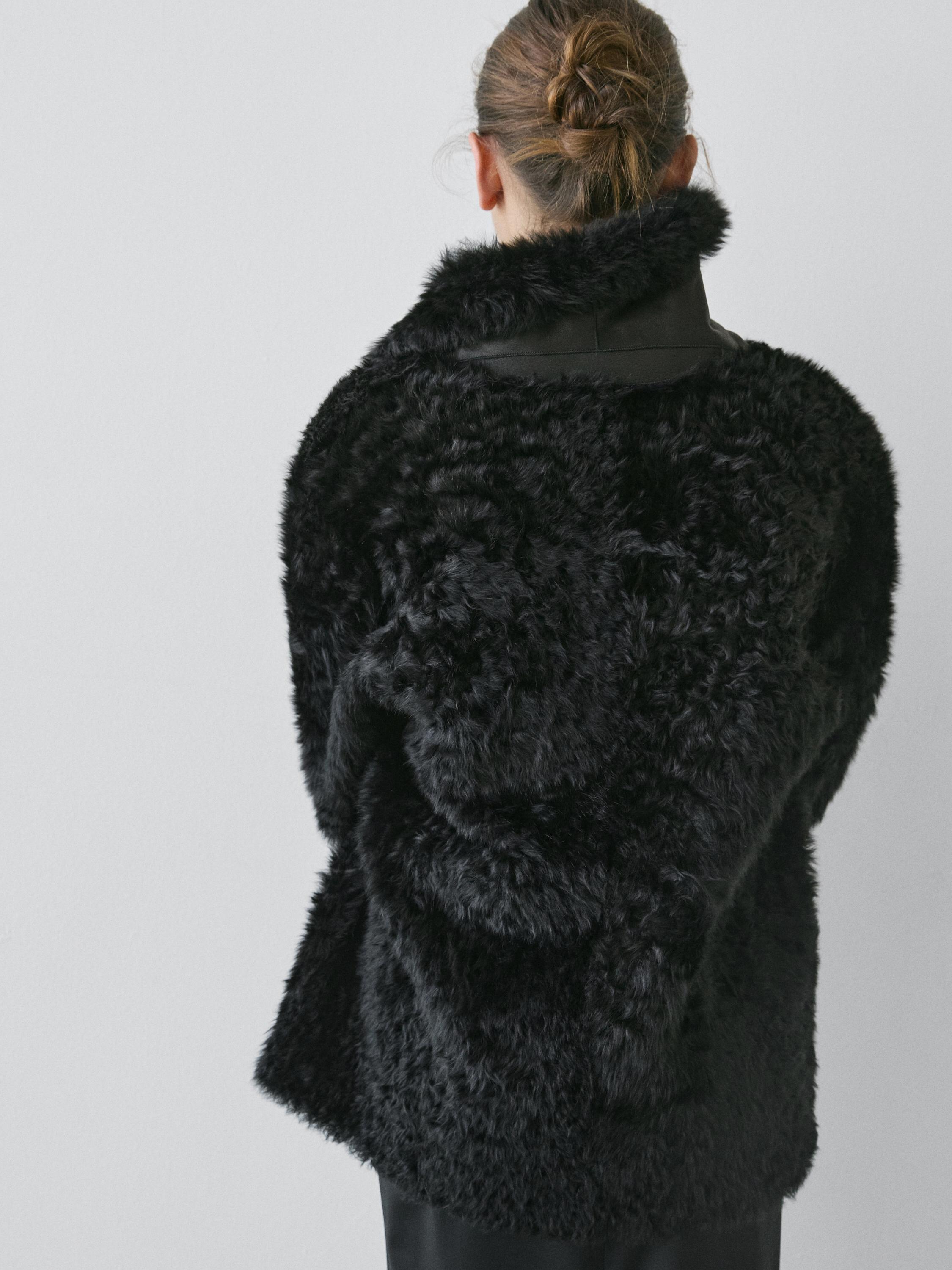Sheepskin leather coat with lapel collar