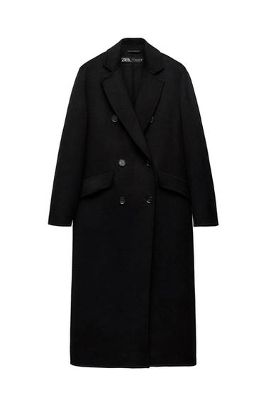 Front view of a long black coat with lapels and double buttons, flap pockets.