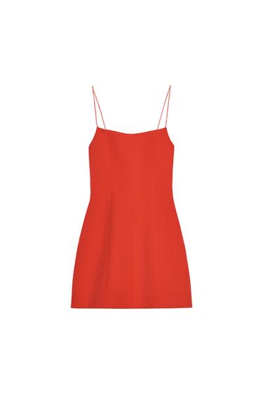 Front view of a red dress with spaghetti straps and a straight cut.