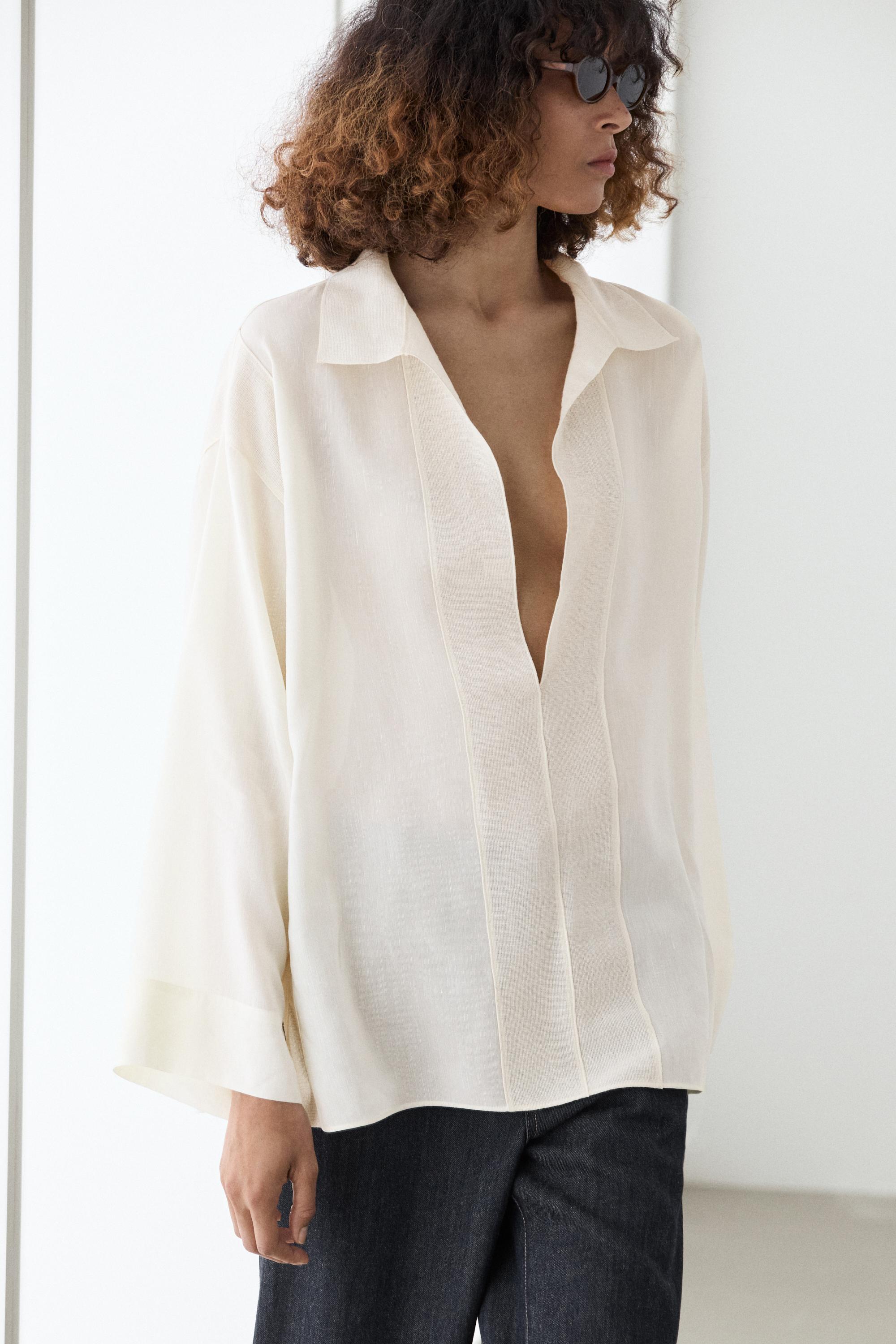 Flowing blouse with seam details